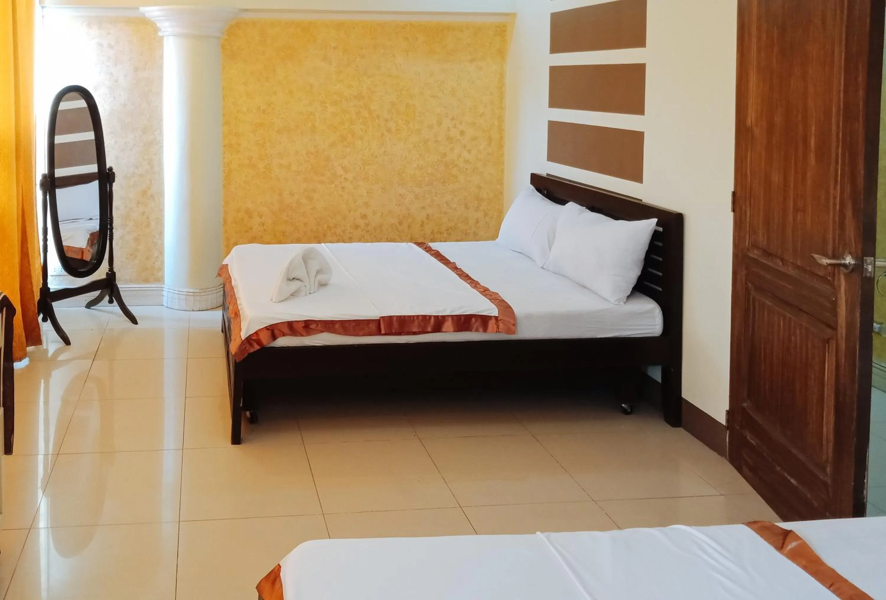 Bedroom in Villa Asuncion Country Inn and Resort Iloilo by RedDoorz