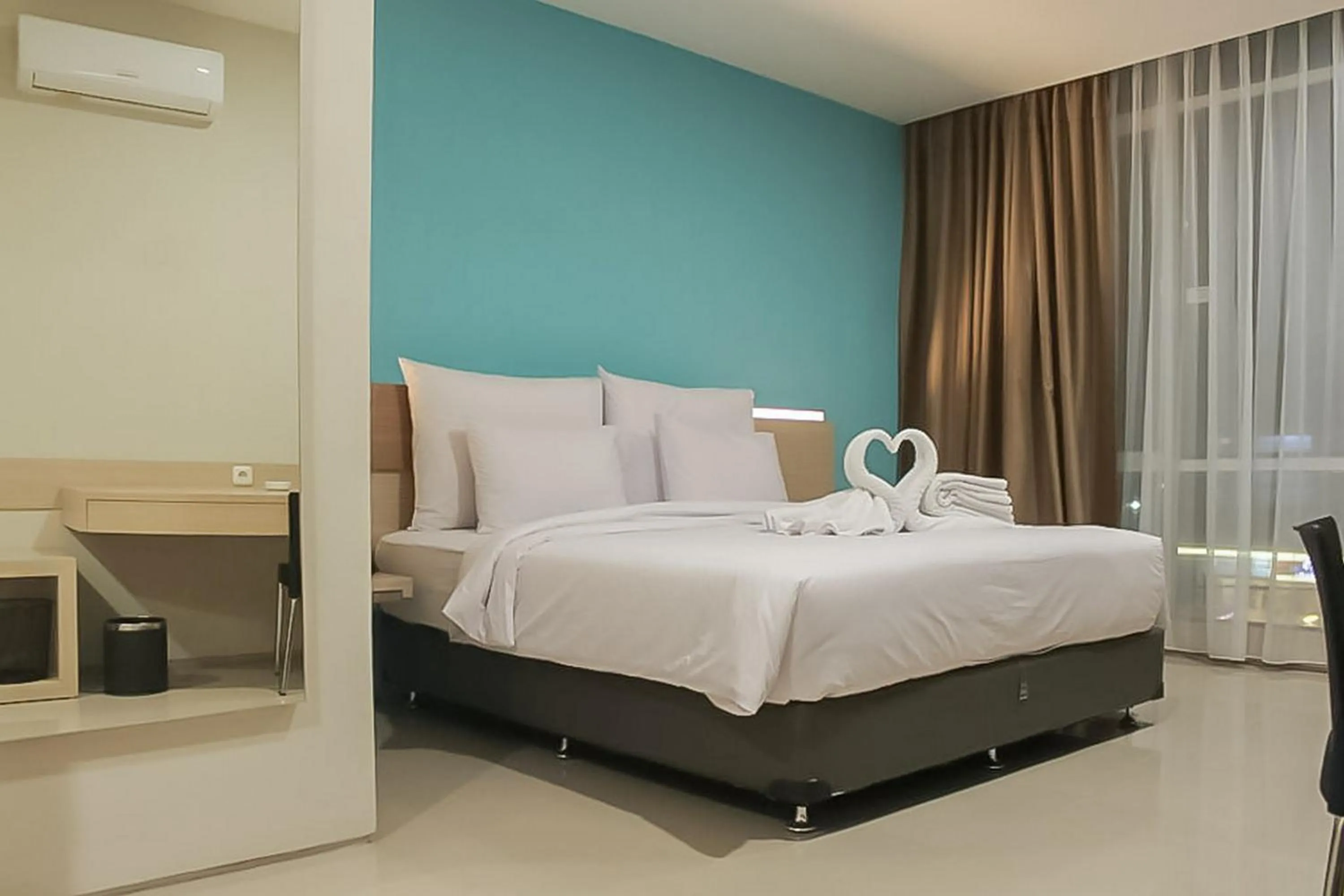 Bed in Hotel Mutiara Padang Sidimpuan Mitra RedDoorz
