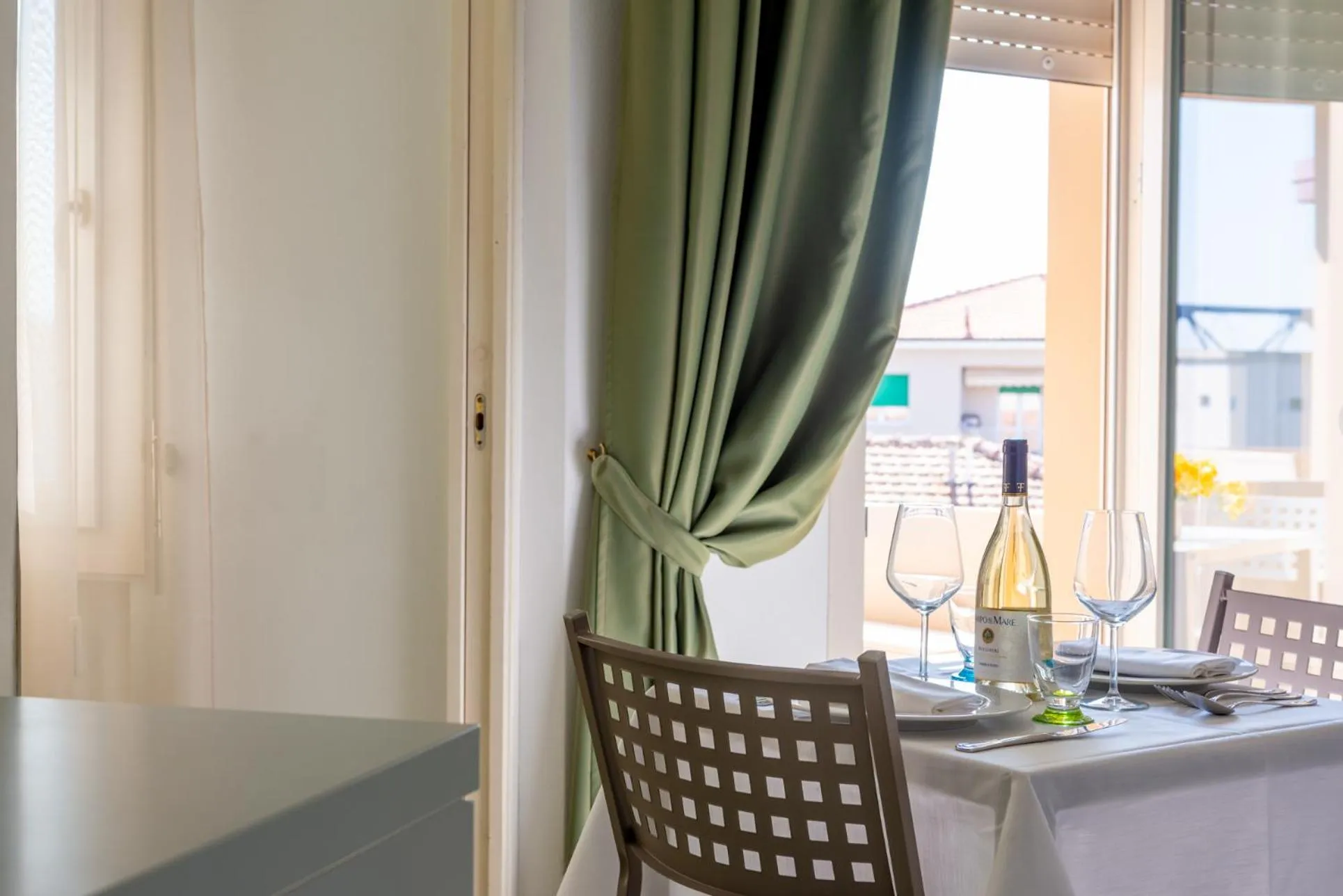 Dining area in Residence Marina di Cecina