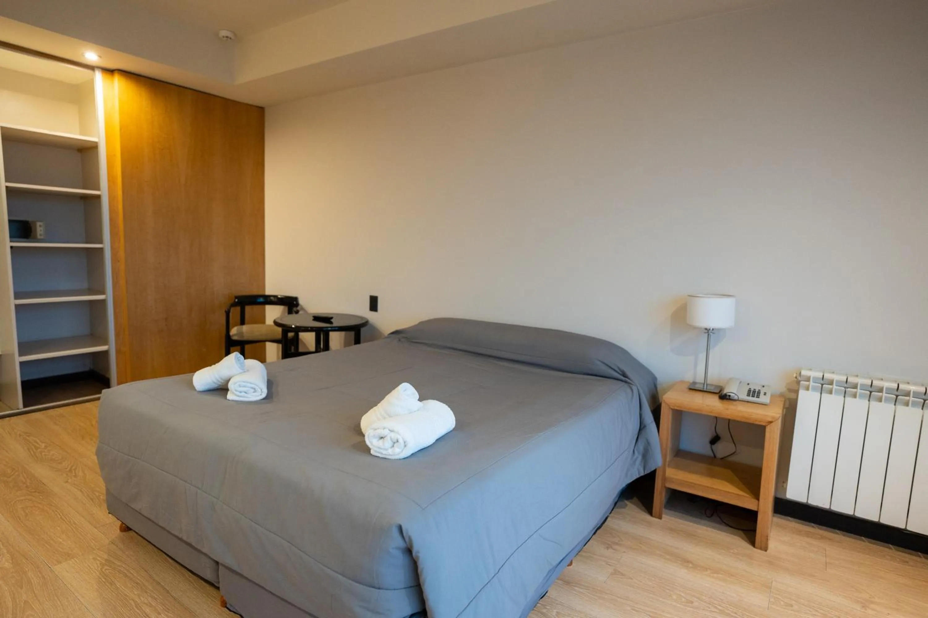 Bed in Hotel Bariloche Suites