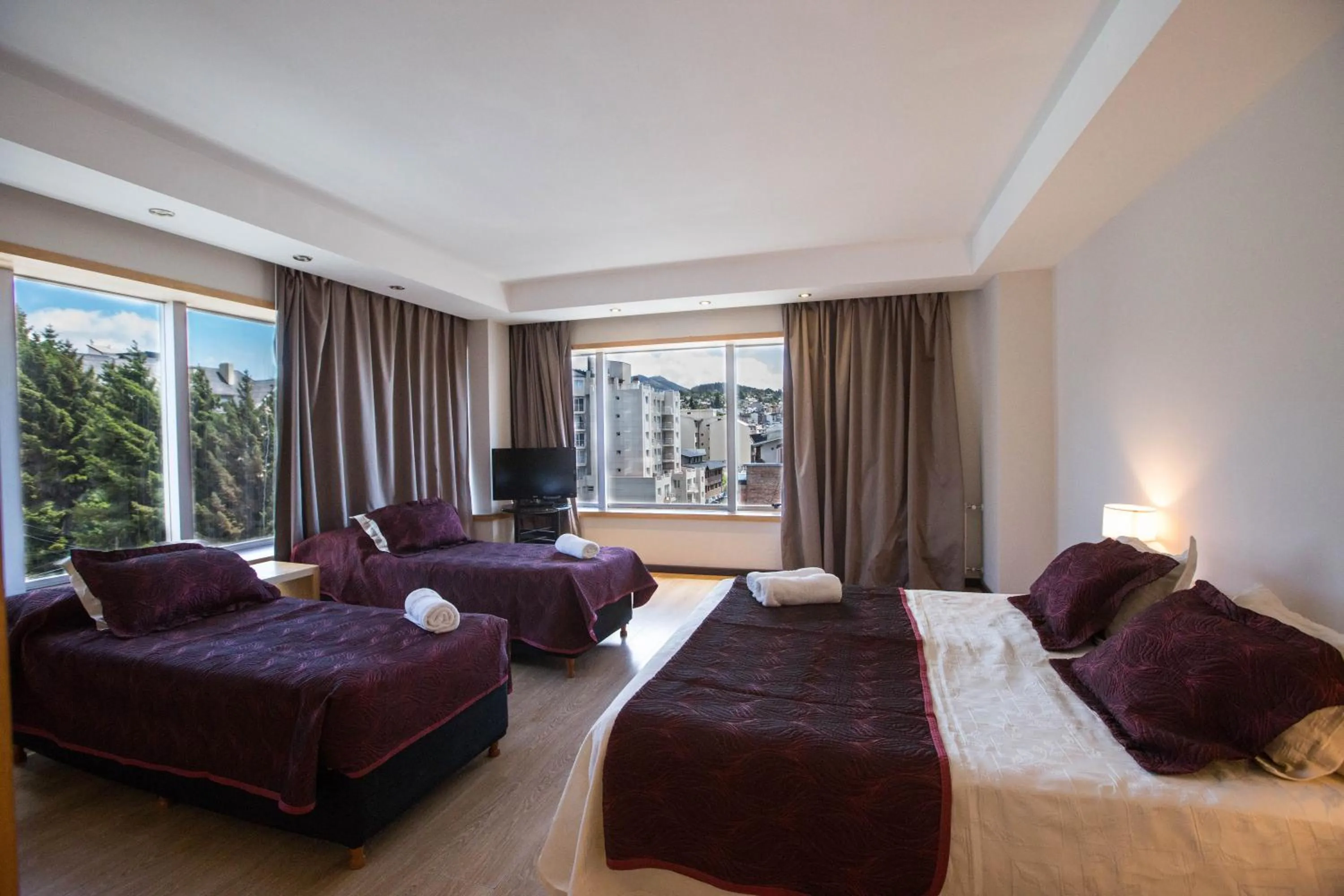 Photo of the whole room, Bed in Hotel Bariloche Suites