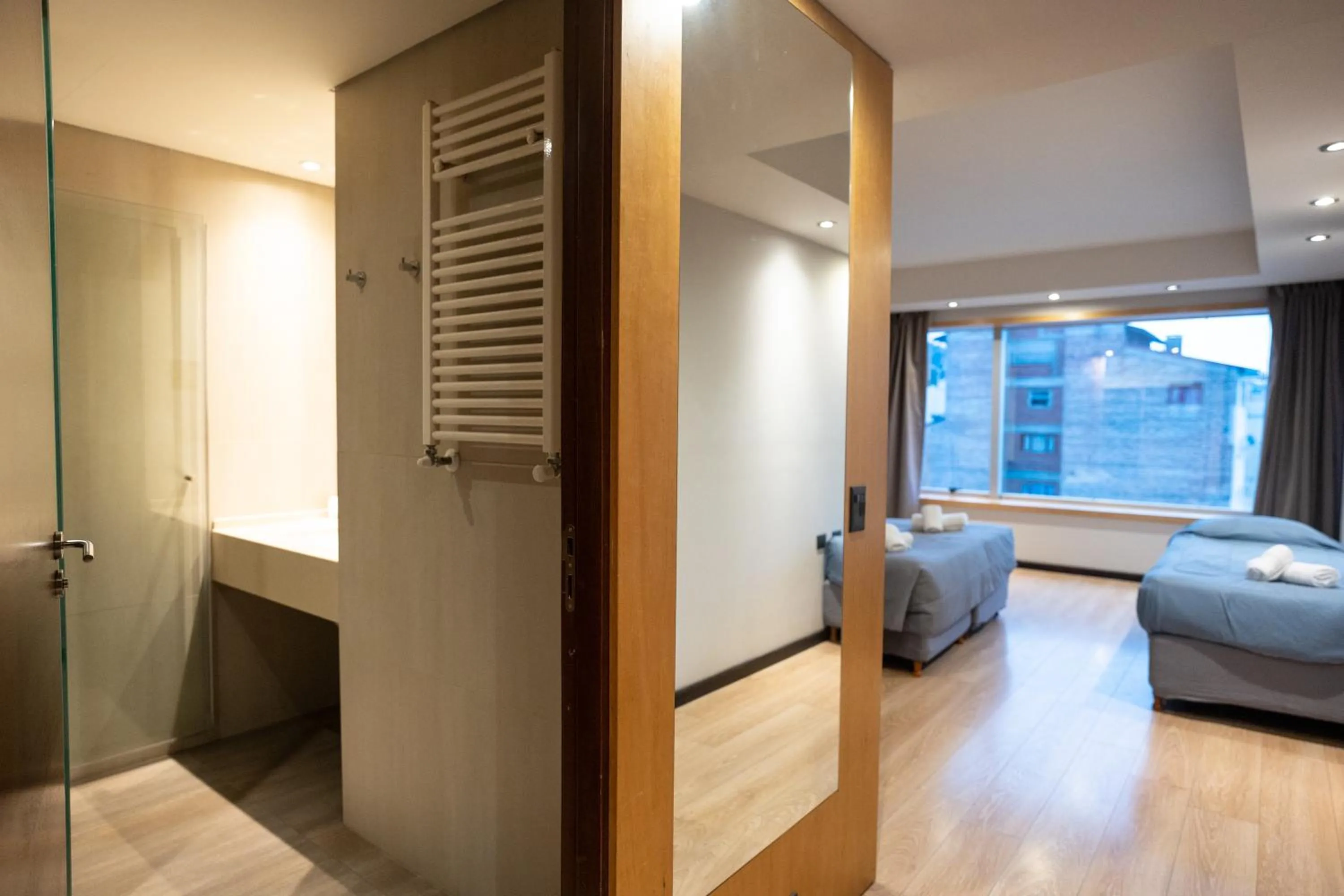 Bed in Hotel Bariloche Suites