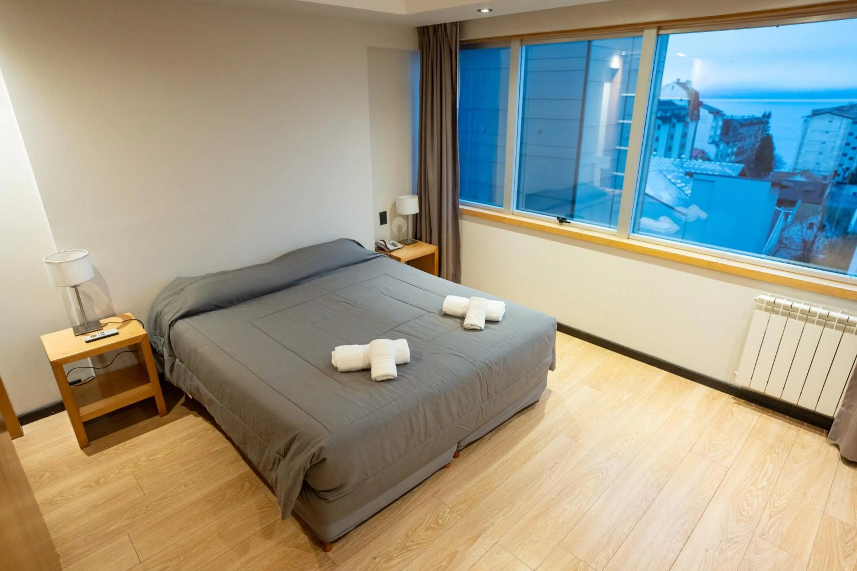 Bed in Hotel Bariloche Suites