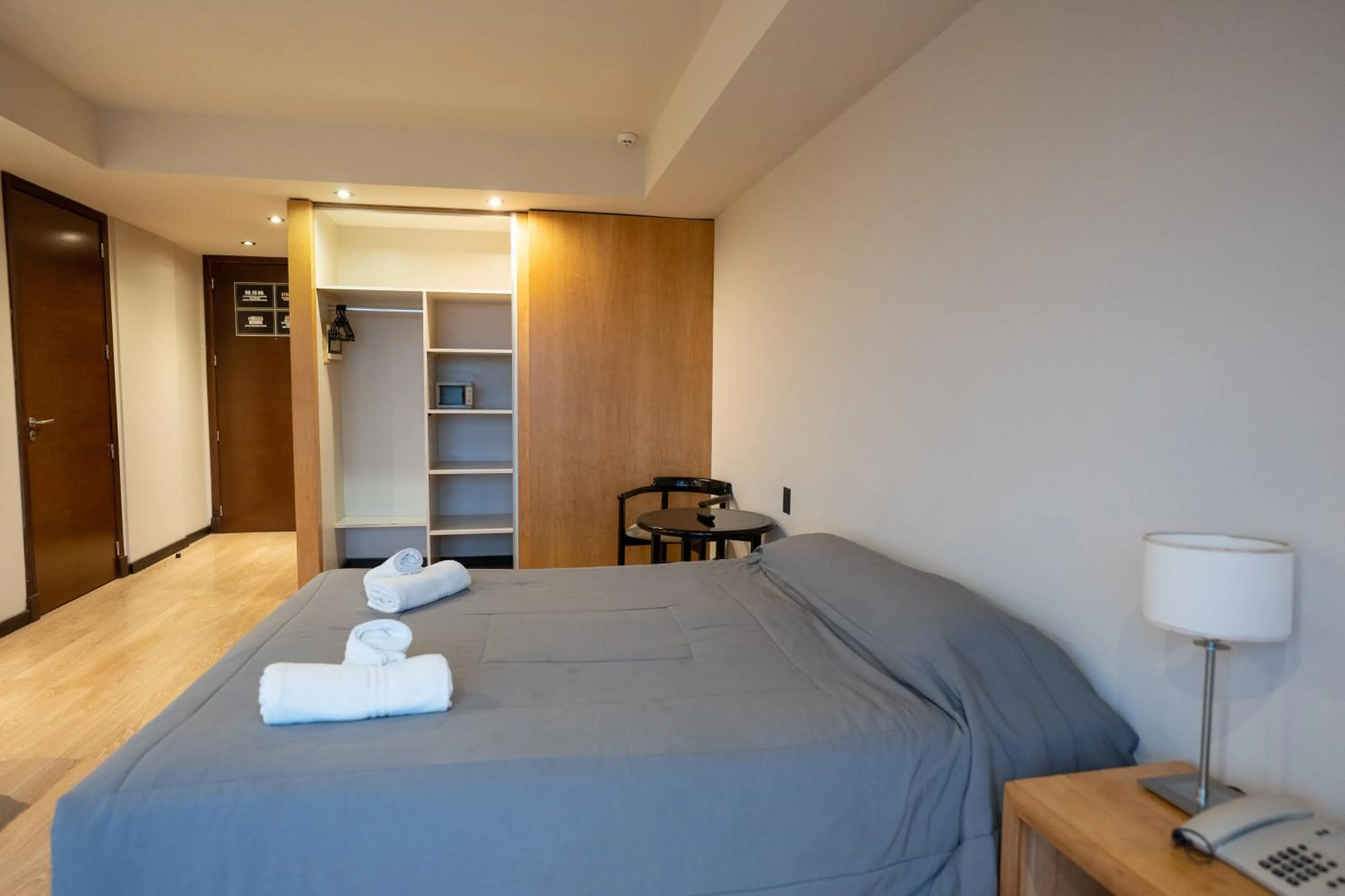 Bed in Hotel Bariloche Suites