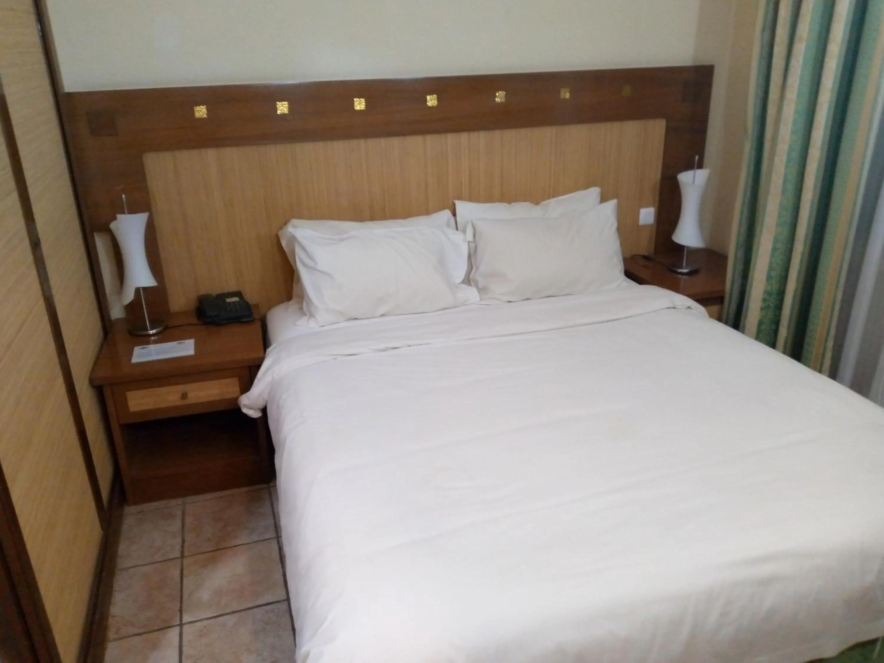 Bed in The Kairaba Beach Hotel