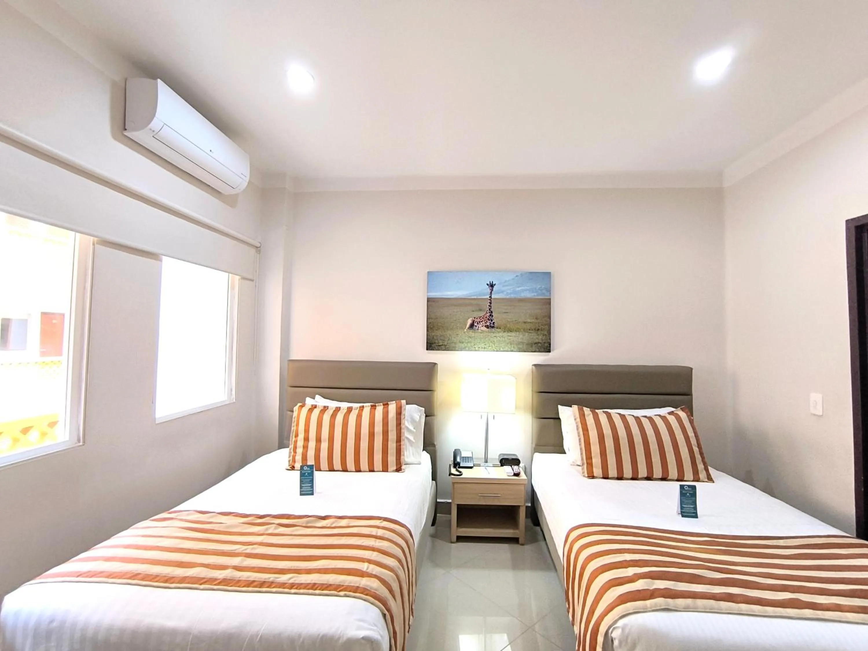 Property building, Bed in Hotel Neiva Plaza