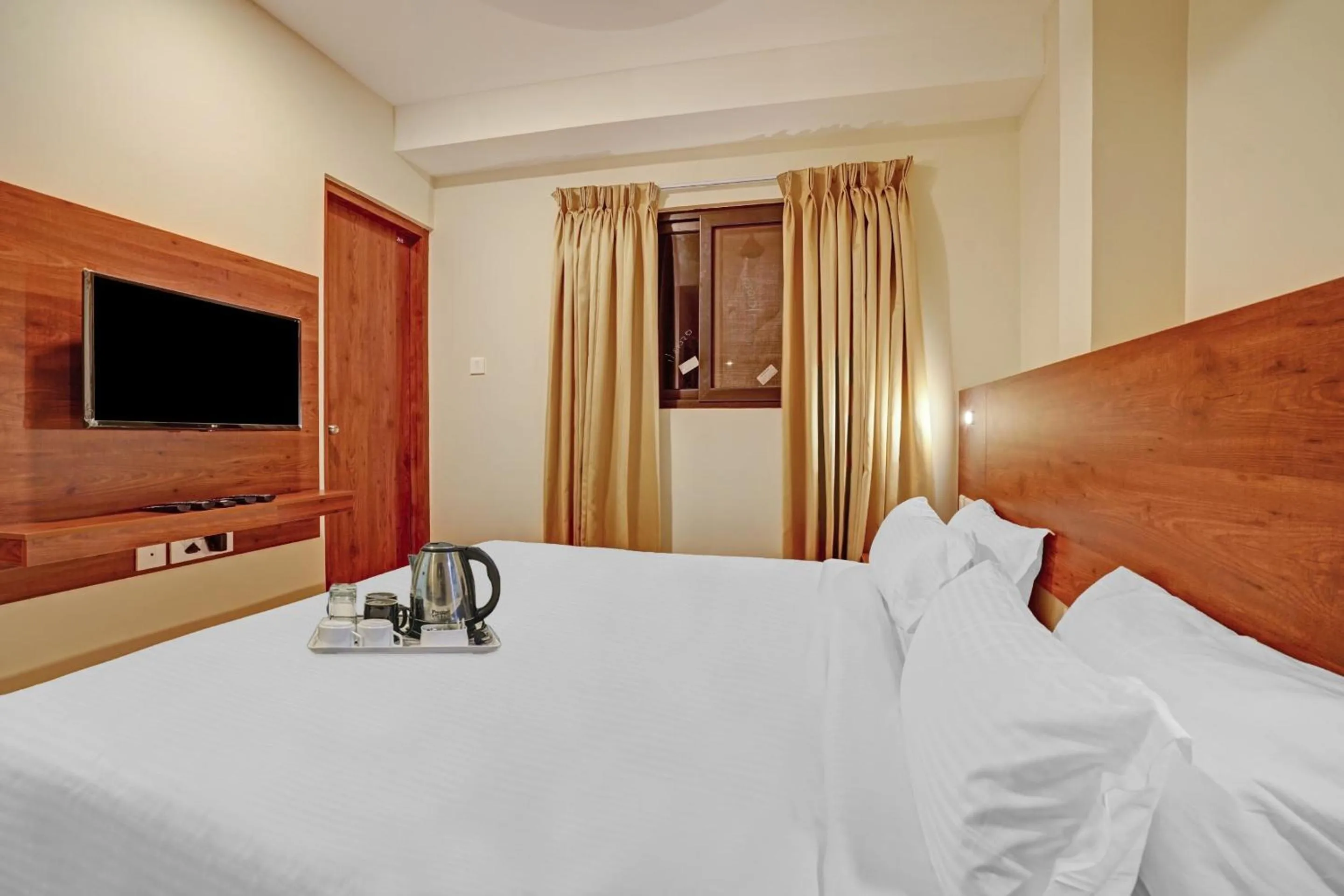 Bedroom, Bed in Super Townhouse Edasserys Sea Pearl