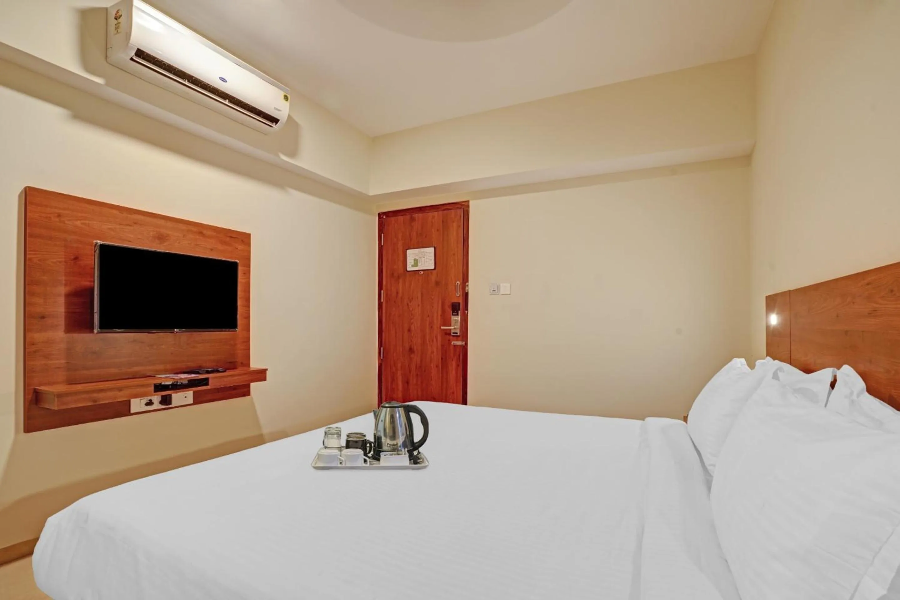 Lobby or reception, Bed in Super Townhouse Edasserys Sea Pearl