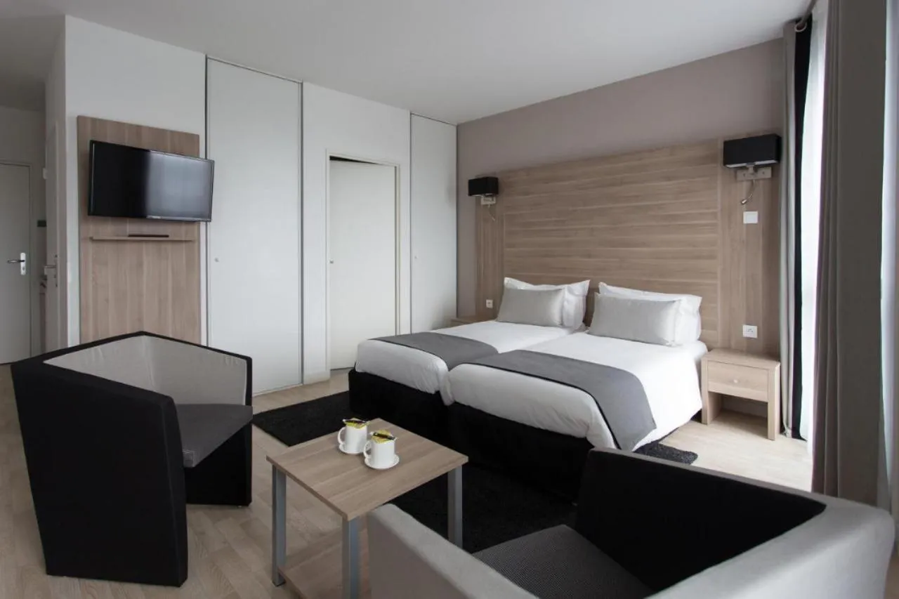 Communal lounge/ TV room, Bed in Twenty Business Flats Lille Grand Stade