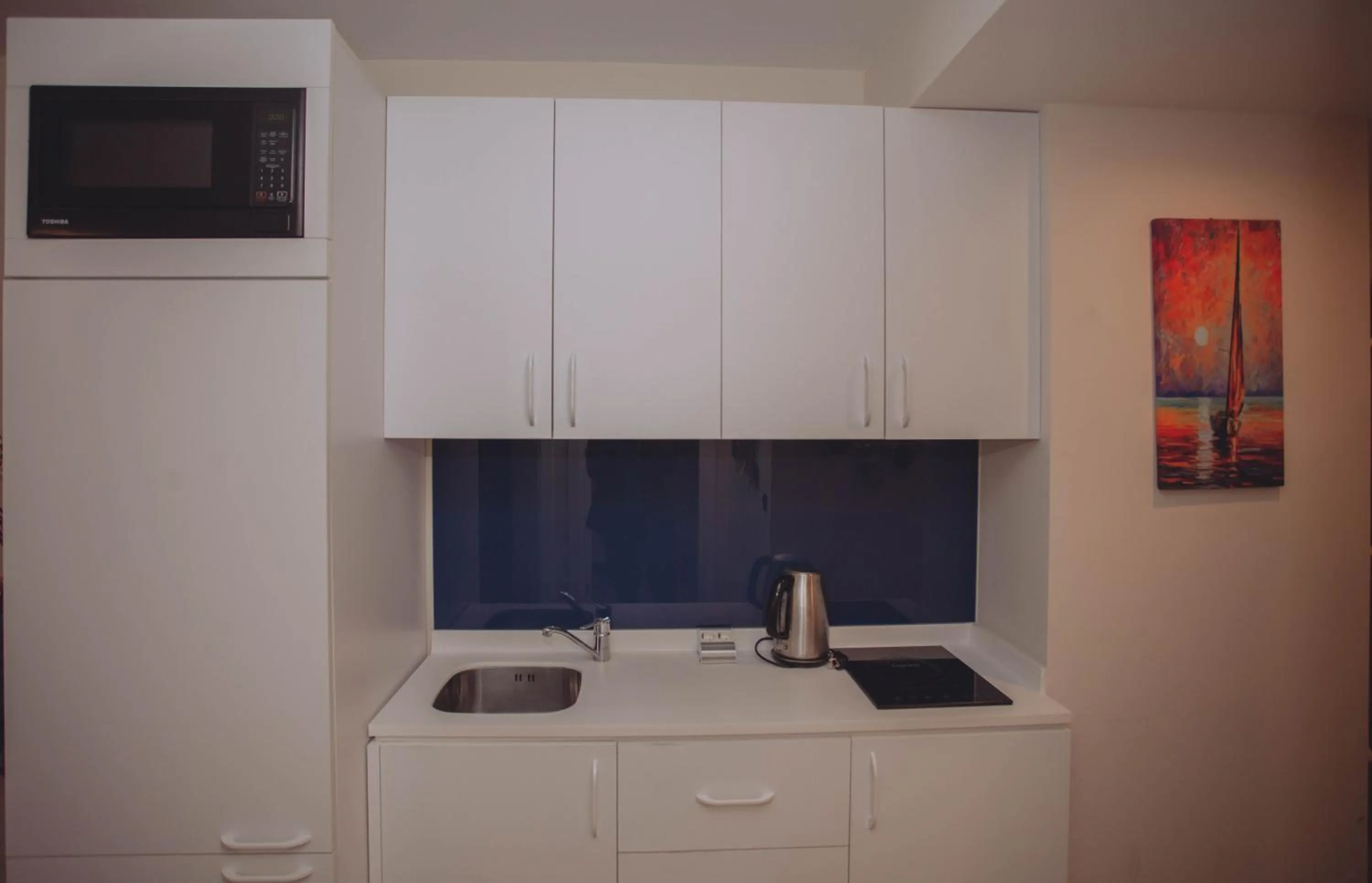 Kitchen or kitchenette in Batumi Luxury Resort & Sea View Aparthotel