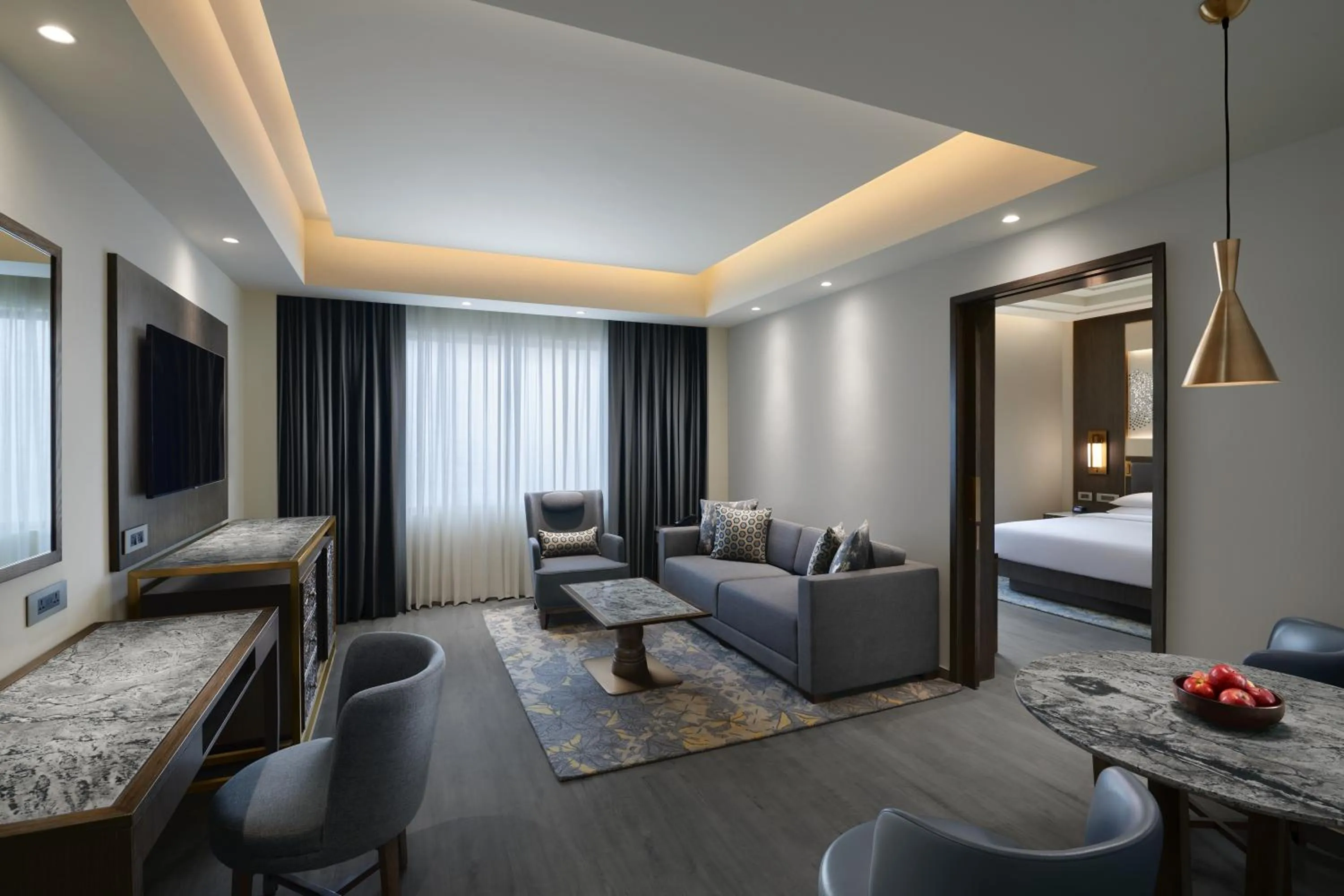 Living room, Bed in Hyatt Regency Jaipur Mansarovar