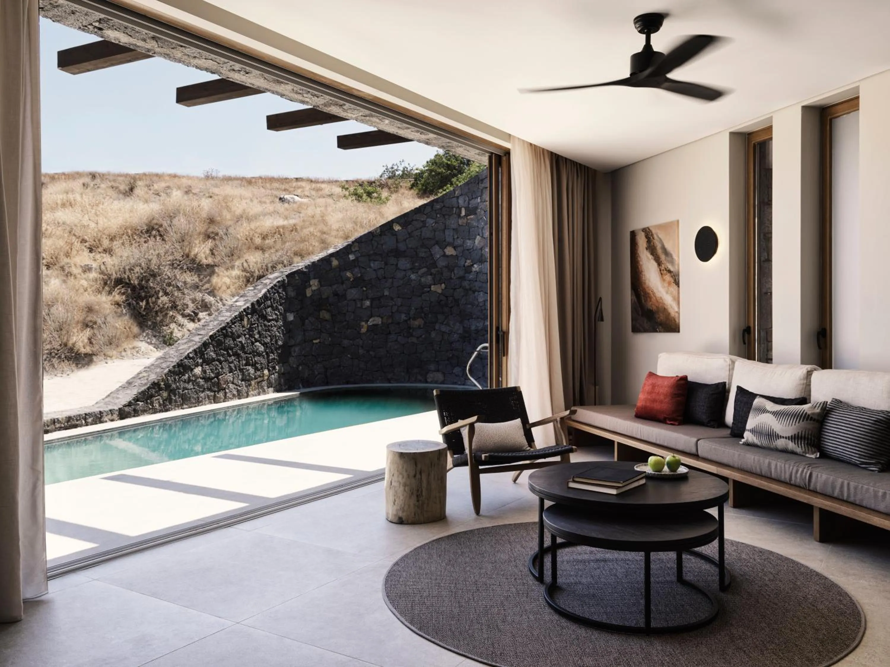 Living room in Magma Resort Santorini, In The Unbound Collection By Hyatt