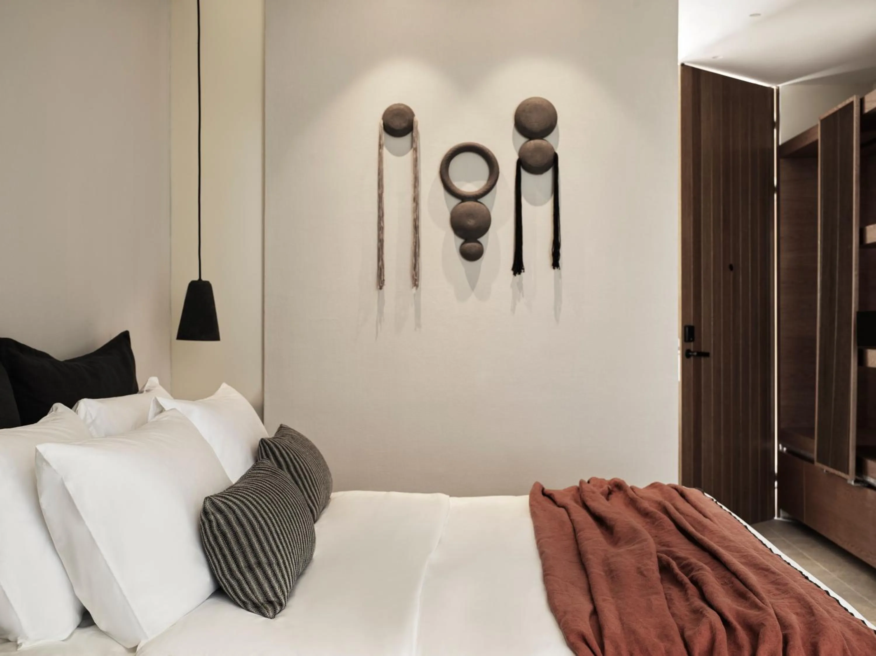 Bed in Magma Resort Santorini, In The Unbound Collection By Hyatt