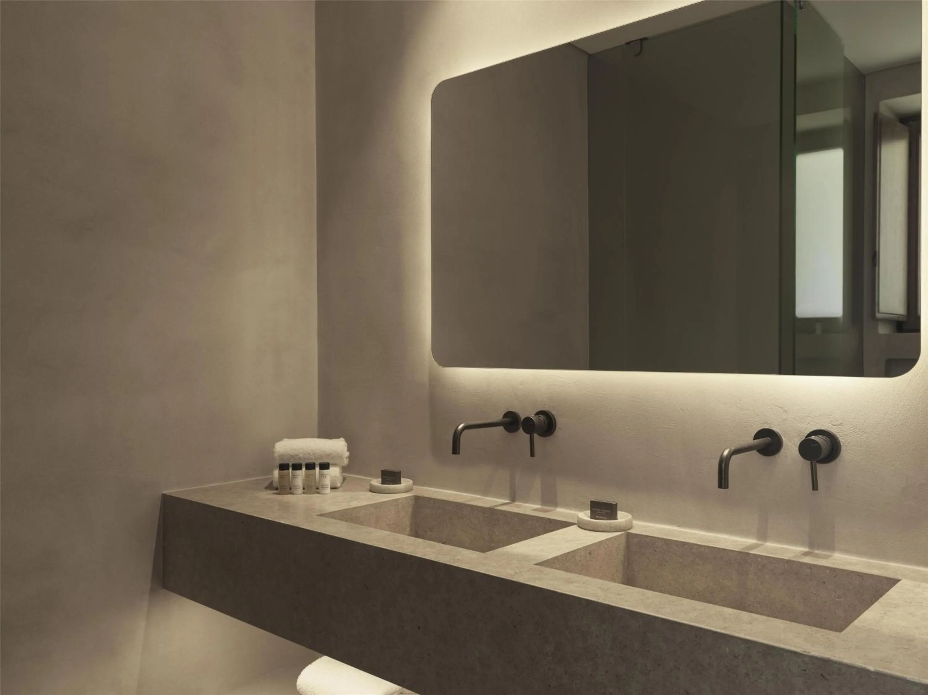 Bathroom in Magma Resort Santorini, In The Unbound Collection By Hyatt