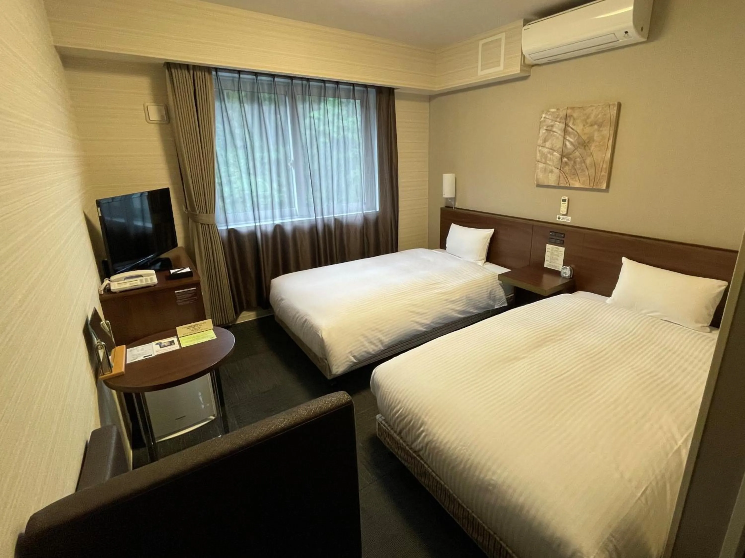 Photo of the whole room, Bed in Hotel Route-Inn Miyako