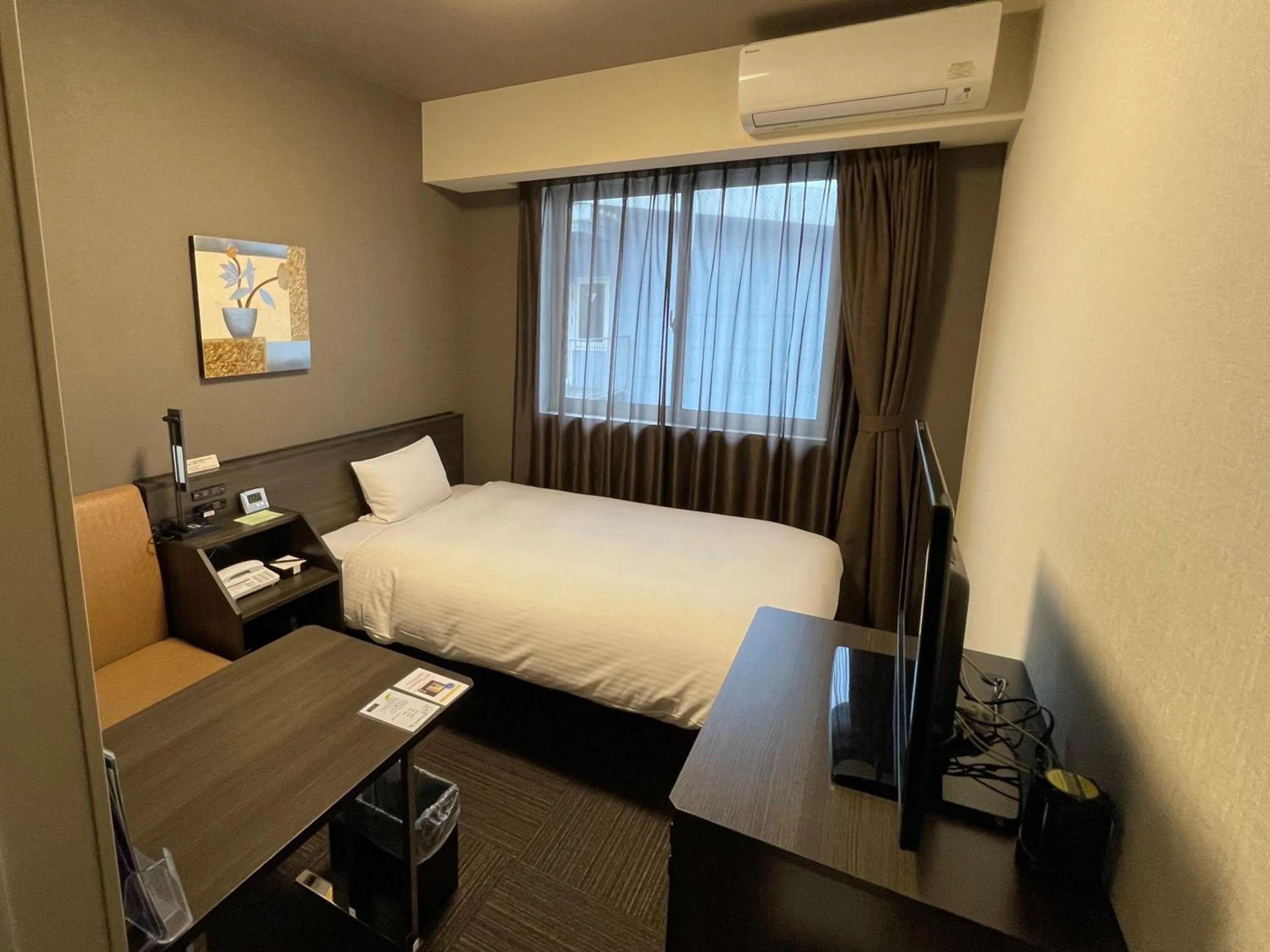 Photo of the whole room, Bed in Hotel Route-Inn Miyako