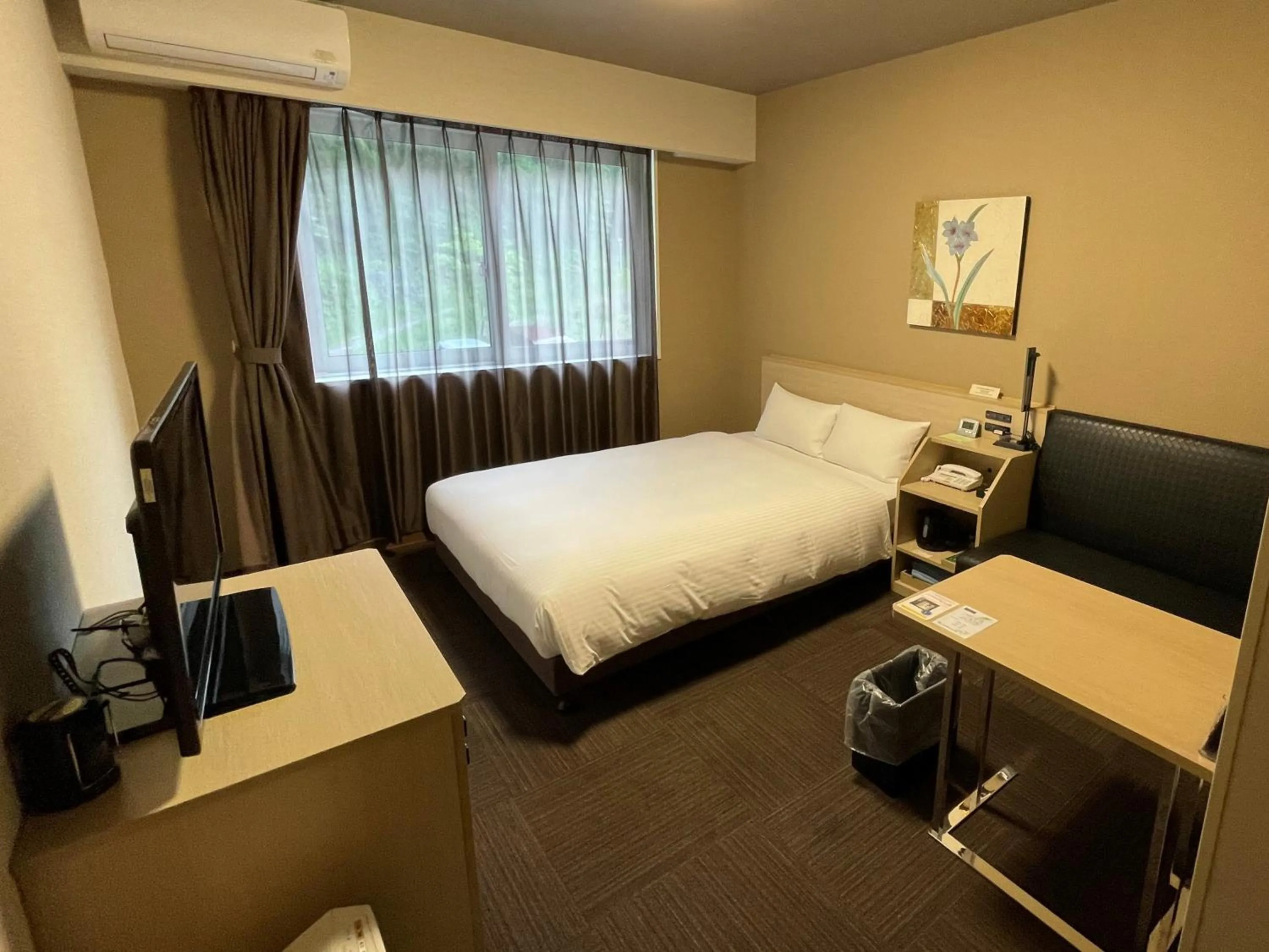 Photo of the whole room, Bed in Hotel Route-Inn Miyako