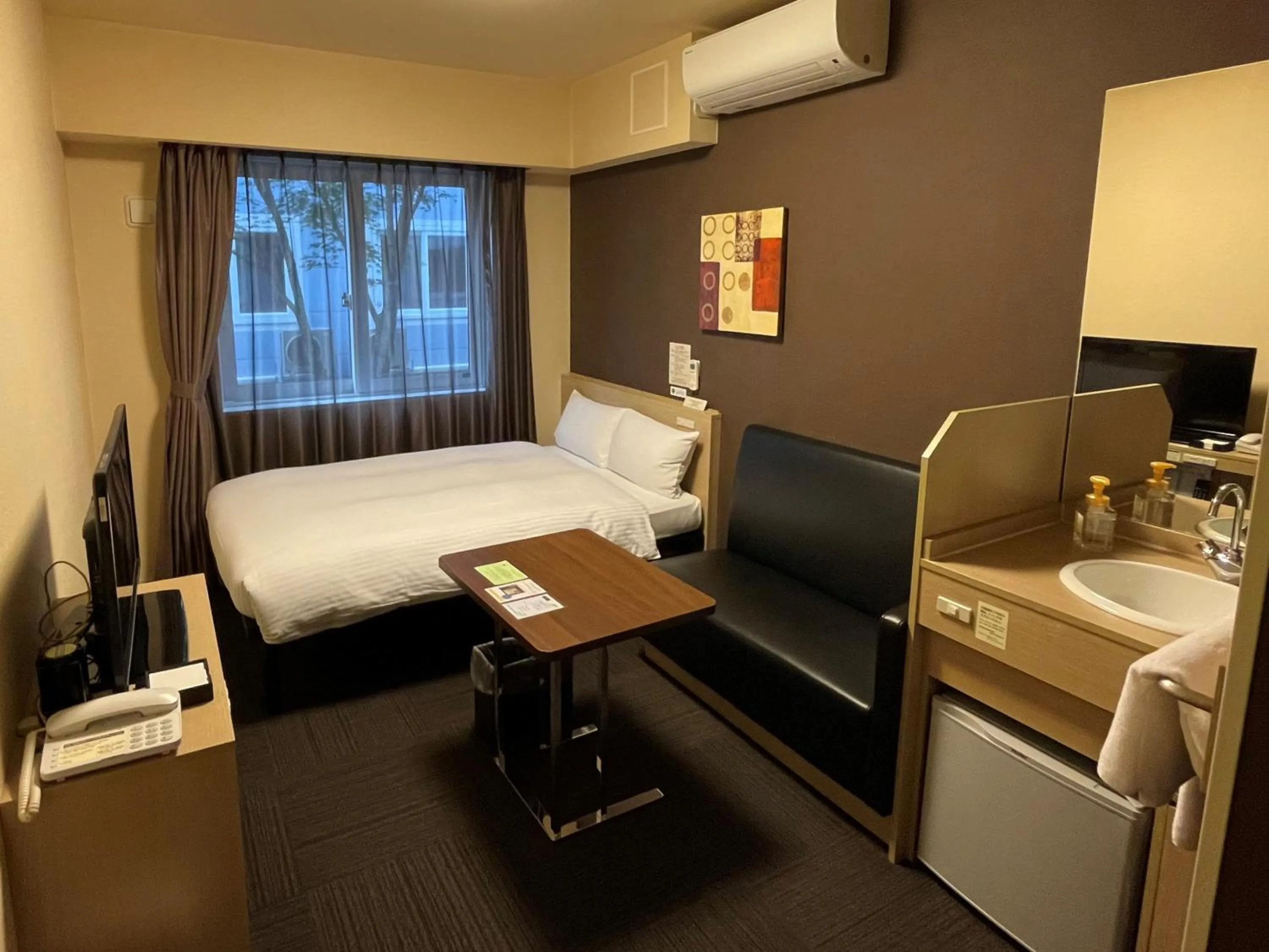 Photo of the whole room, Bed in Hotel Route-Inn Miyako