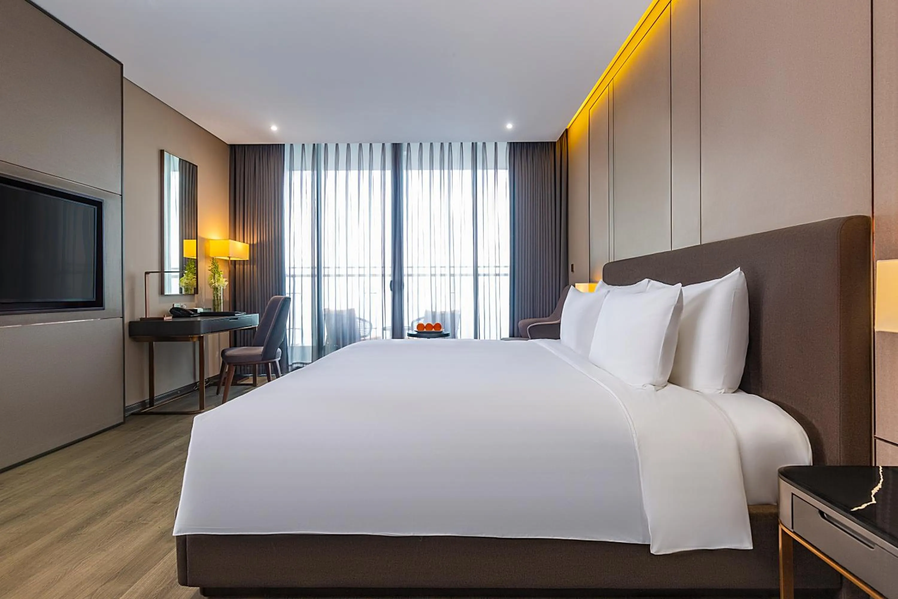 Bed in Le Sands Oceanfront Danang Hotel