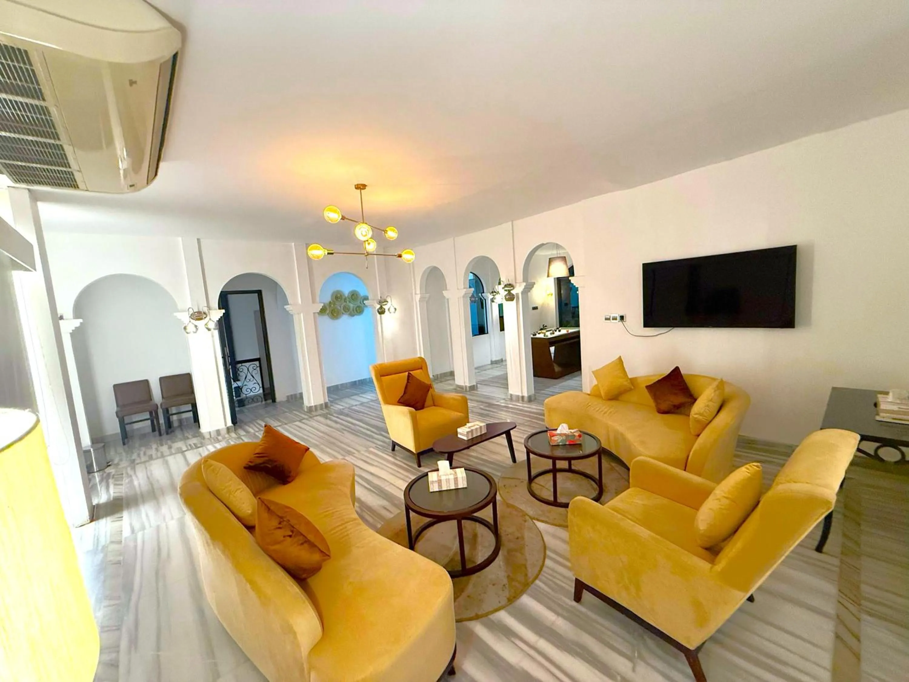 Communal lounge/ TV room in The Elite Residence Dhaka