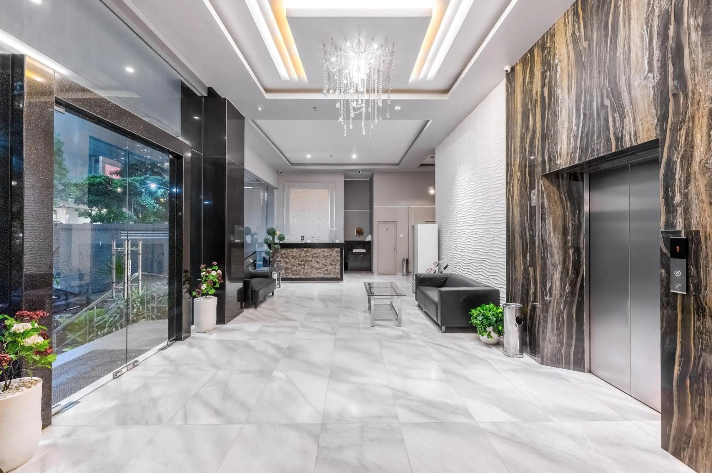 Lobby or reception, Bed in Grand Thamrin Hotel