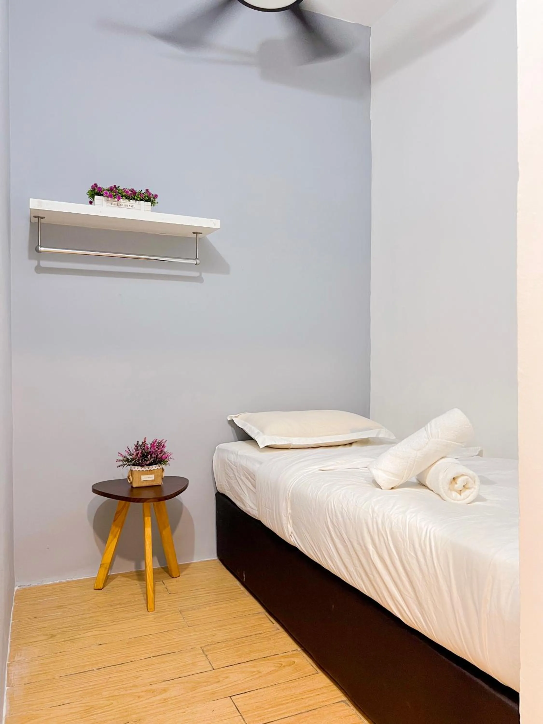 Bed in Hush Inn at ITCC Manhattan Suites