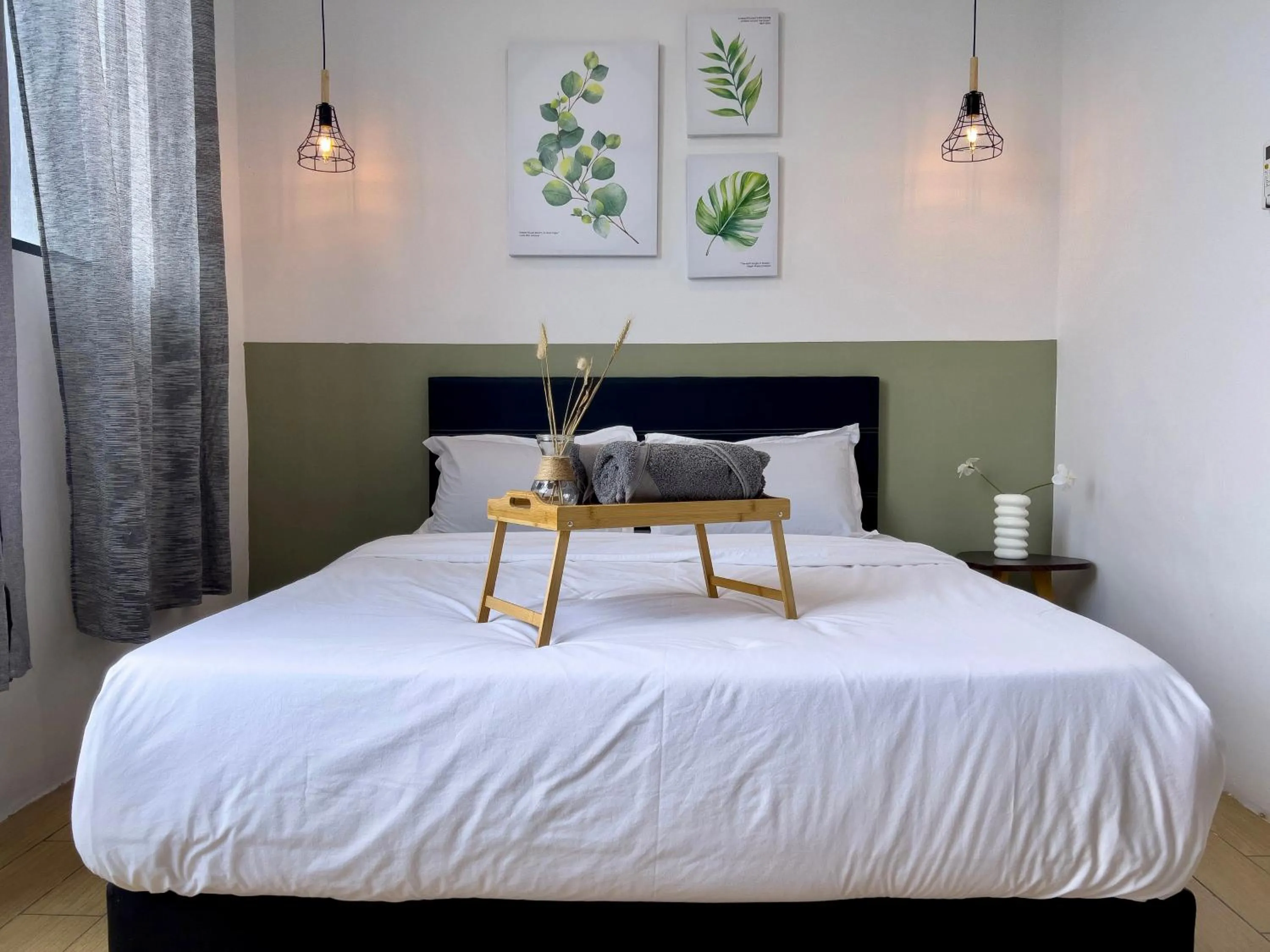 Bed in Hush Inn at ITCC Manhattan Suites