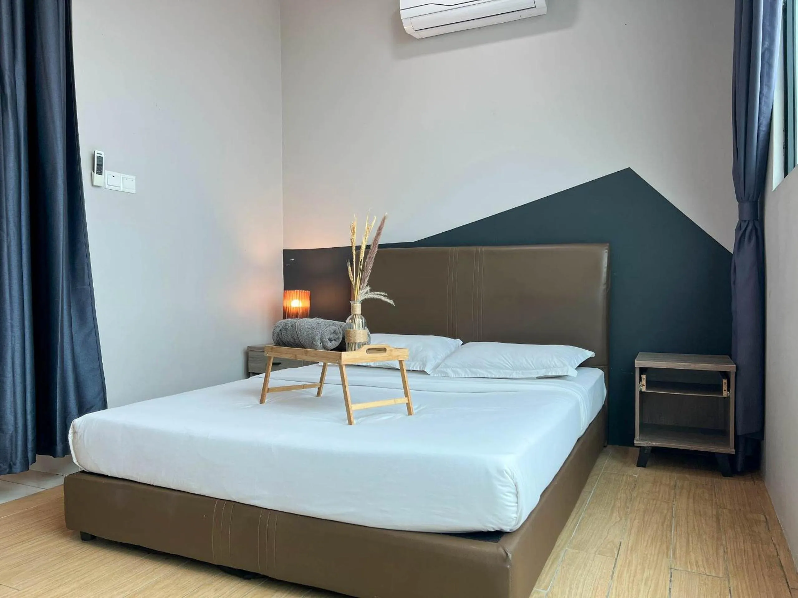 Bed in Hush Inn at ITCC Manhattan Suites