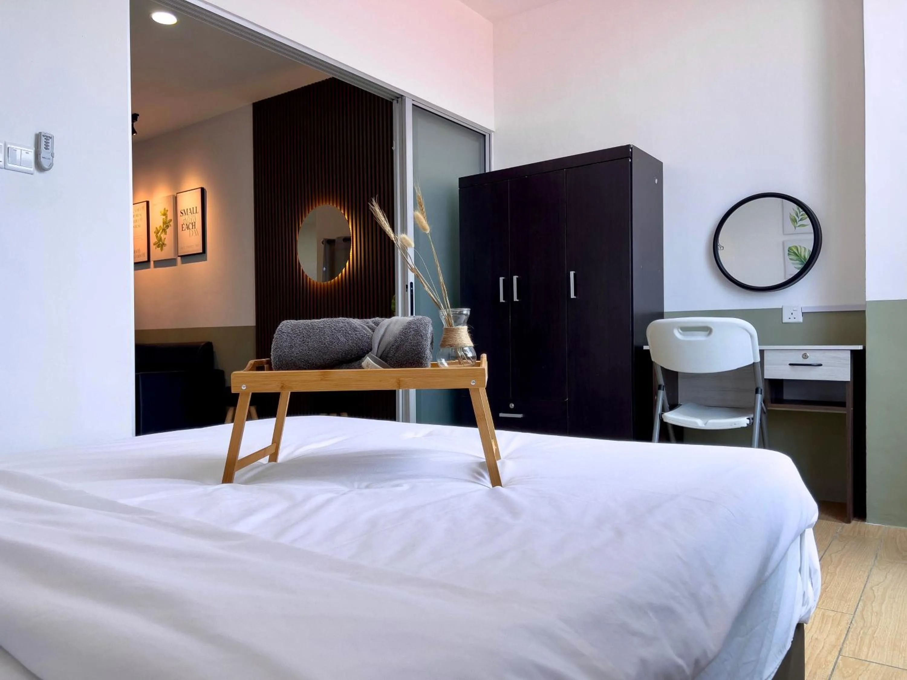 Bed in Hush Inn at ITCC Manhattan Suites