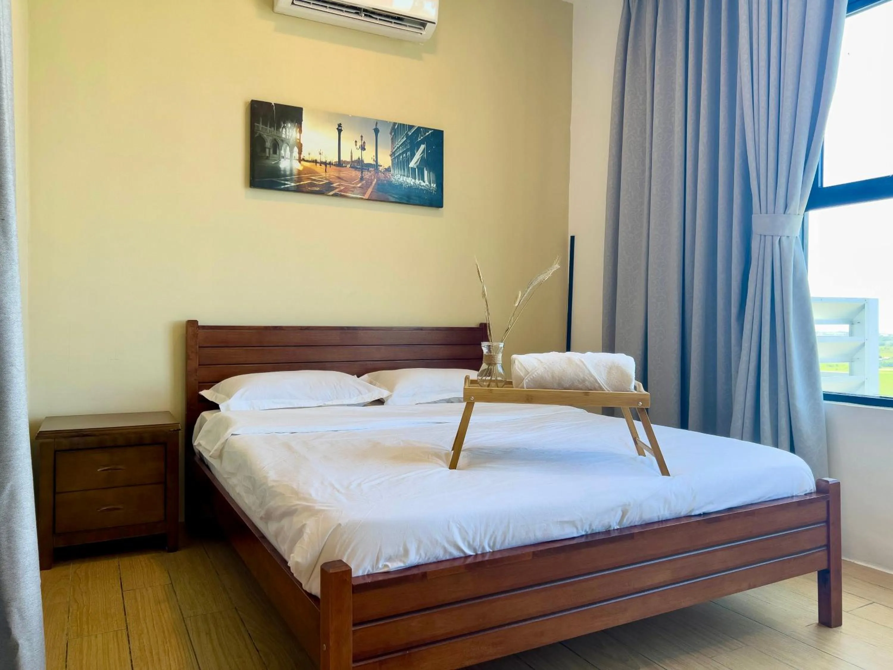 Bed in Hush Inn at ITCC Manhattan Suites