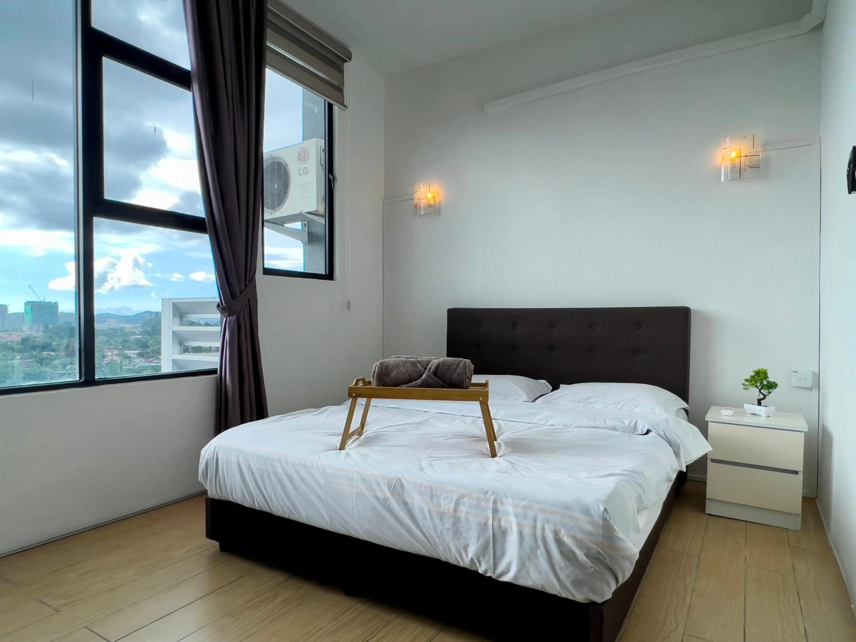 Bed in Hush Inn at ITCC Manhattan Suites