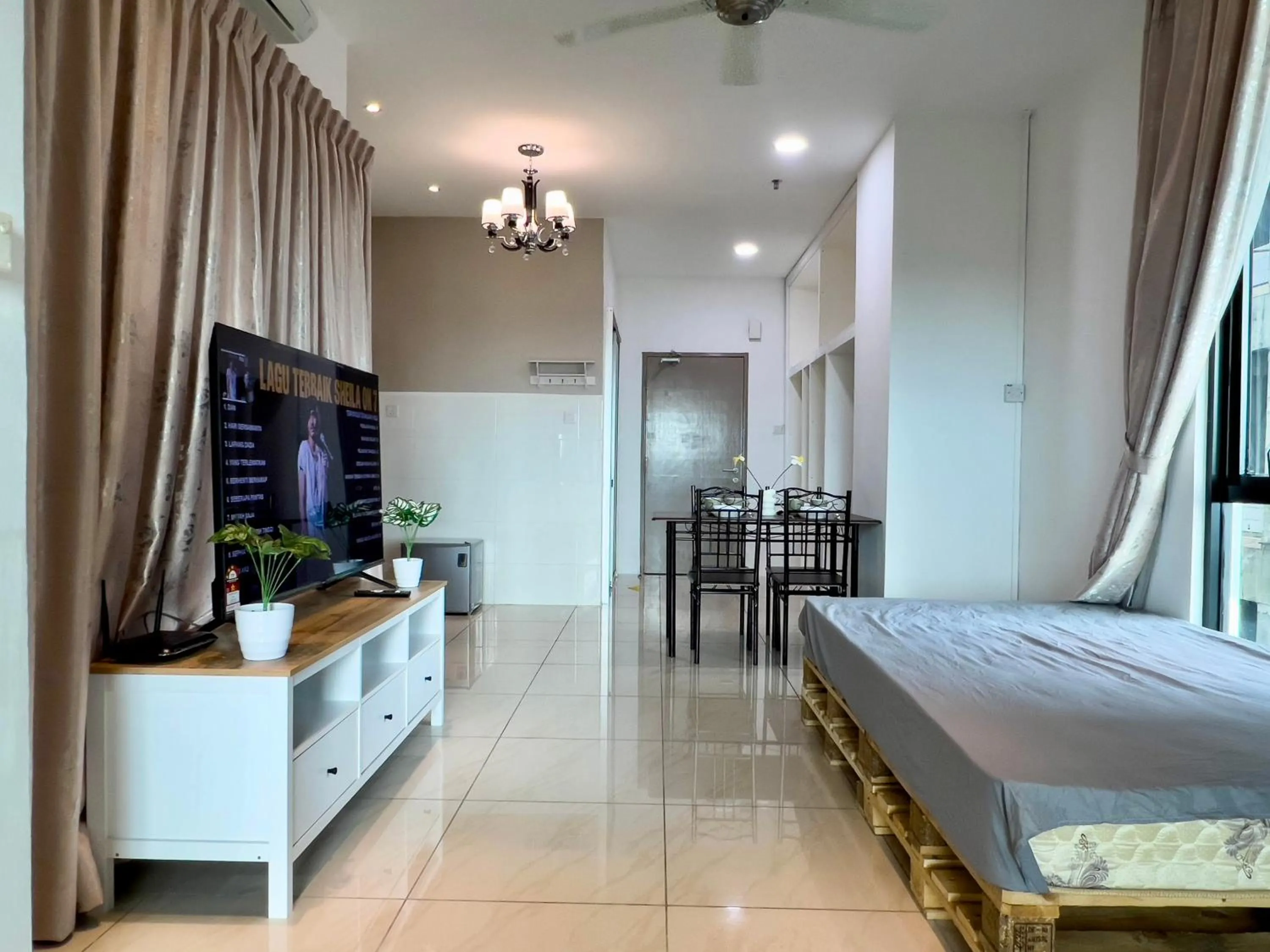 Bed in Hush Inn at ITCC Manhattan Suites