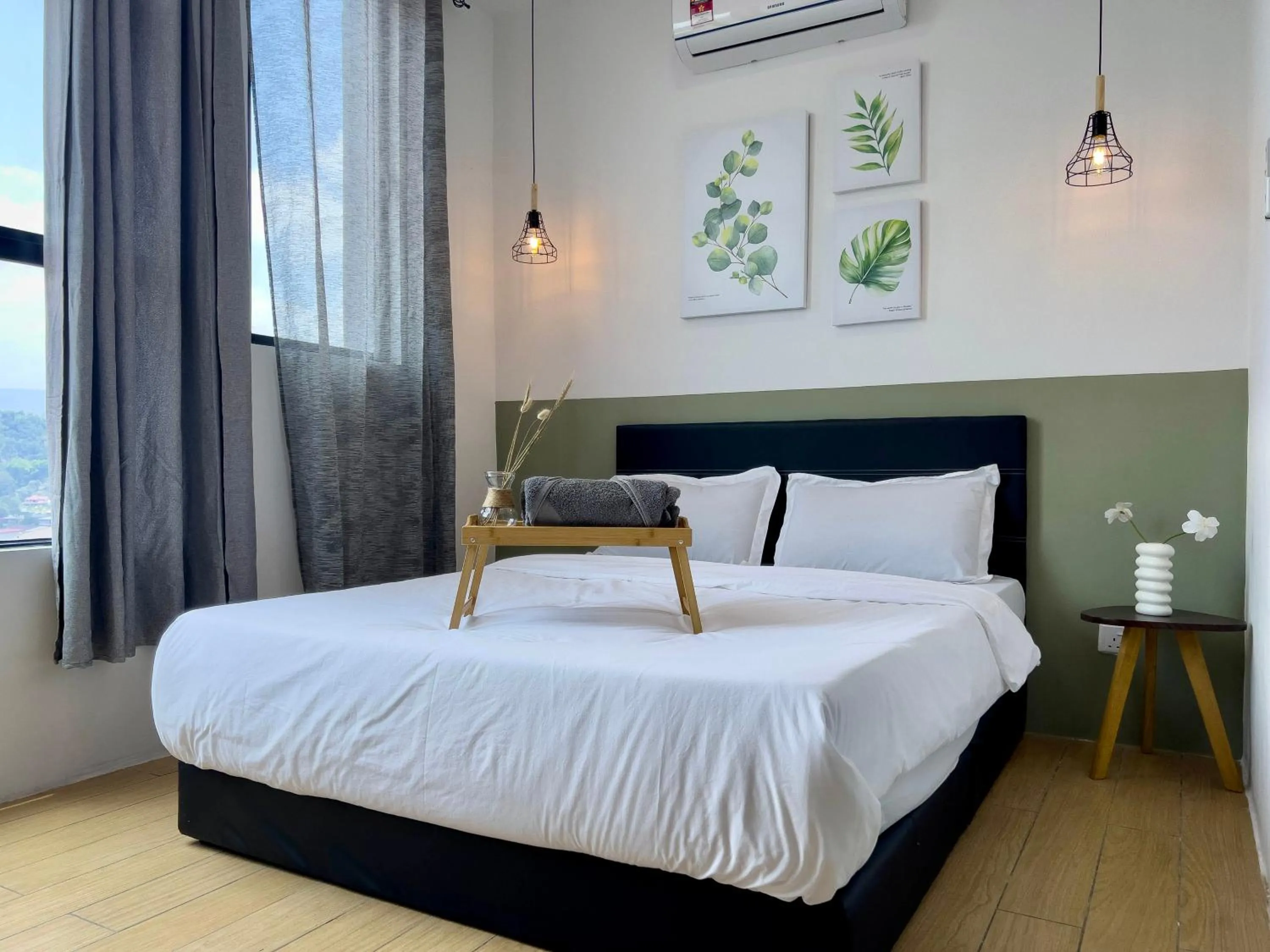 Bed in Hush Inn at ITCC Manhattan Suites