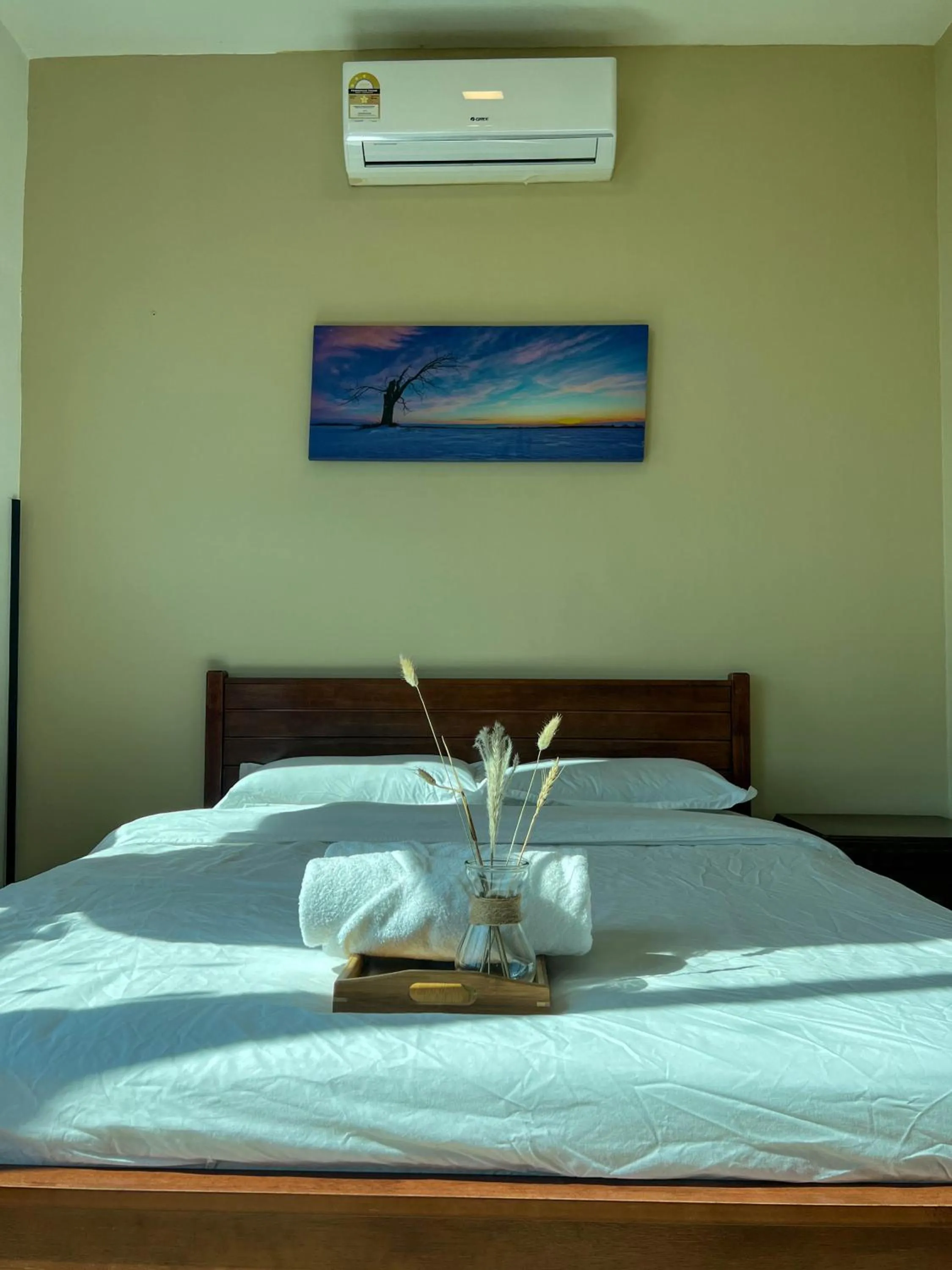 Bed in Hush Inn at ITCC Manhattan Suites