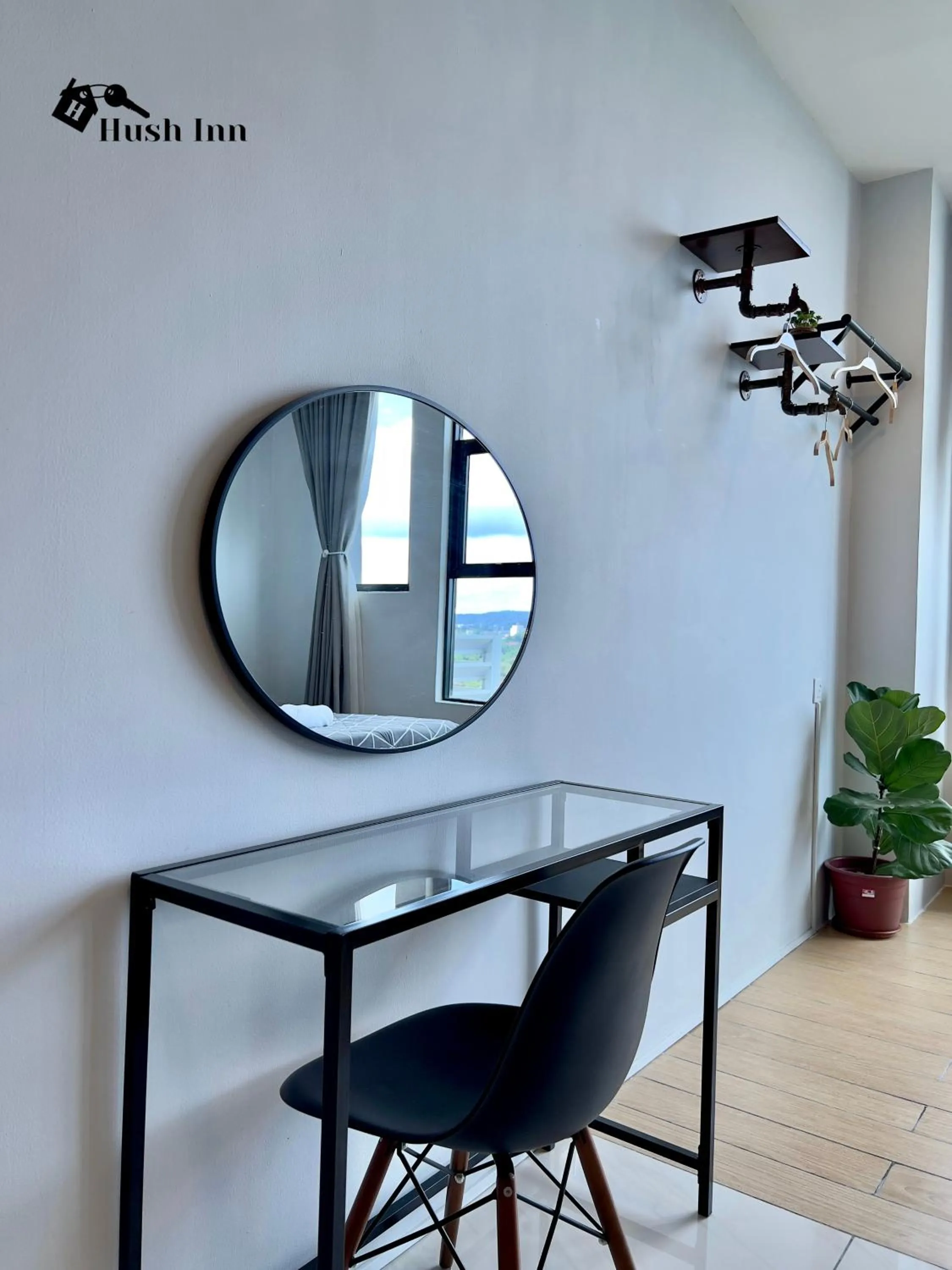 Seating area in Hush Inn at ITCC Manhattan Suites