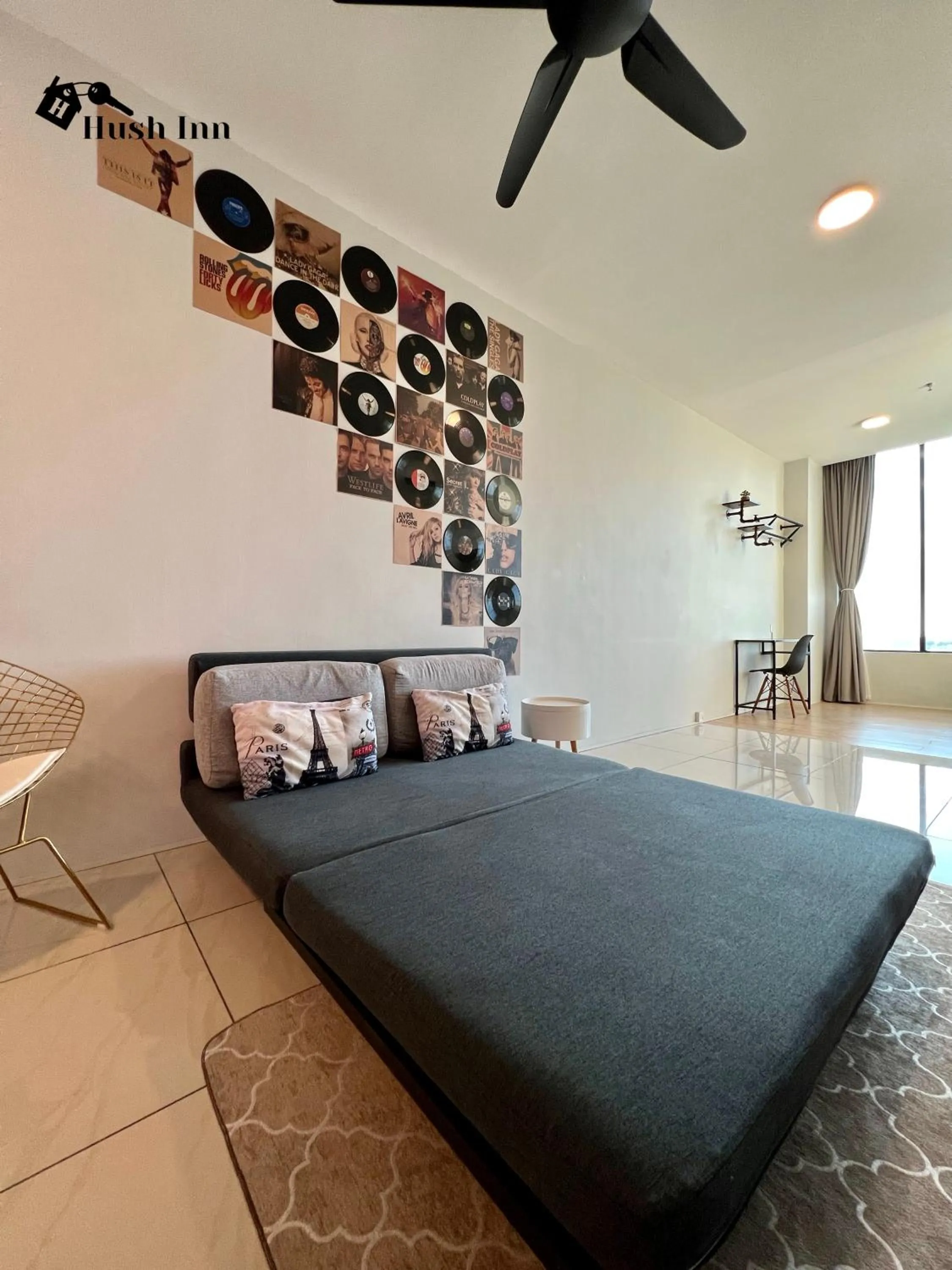 Bed in Hush Inn at ITCC Manhattan Suites