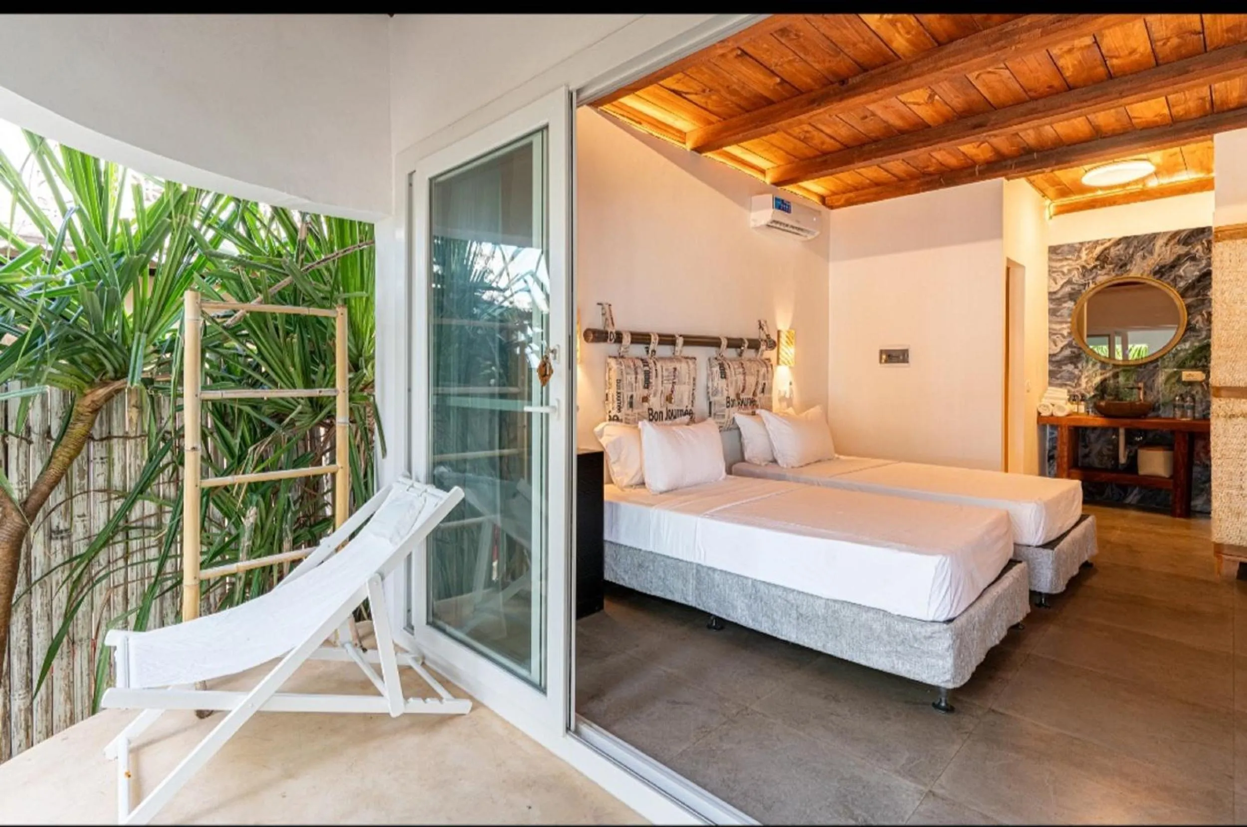 Photo of the whole room, Bed in Coral Rocks Hotel & Restaurant