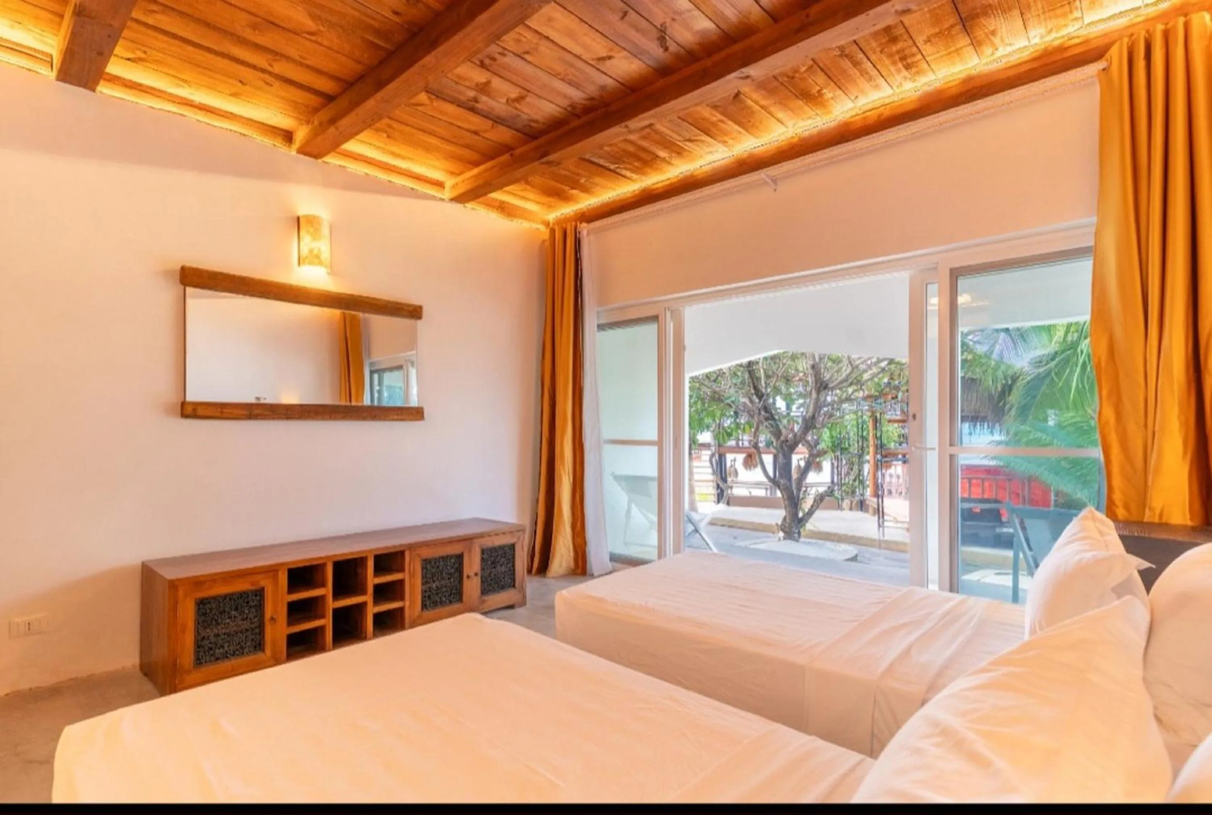 Bed in Coral Rocks Hotel & Restaurant