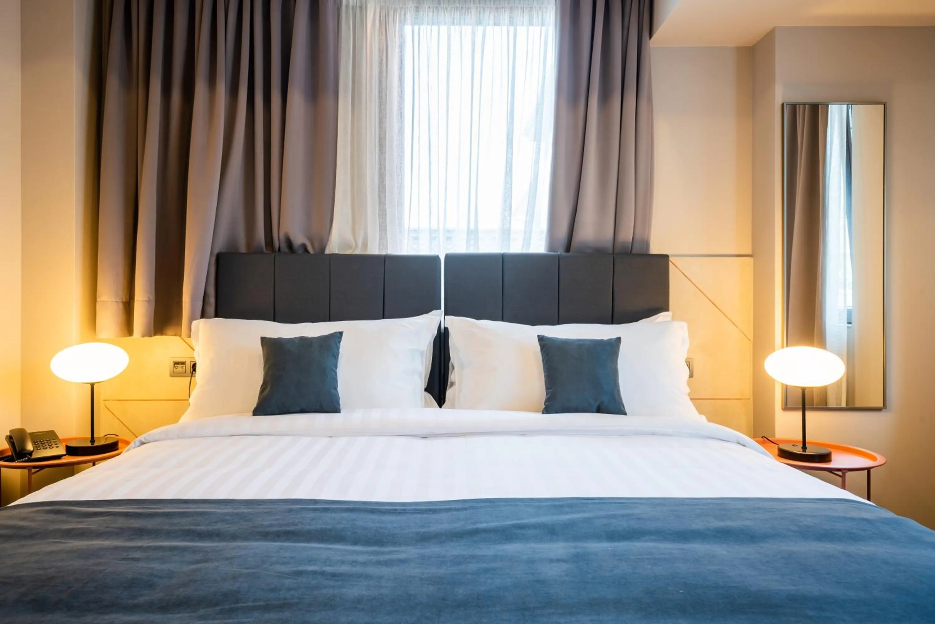 Bed in Reikartz King Tamar Tbilisi