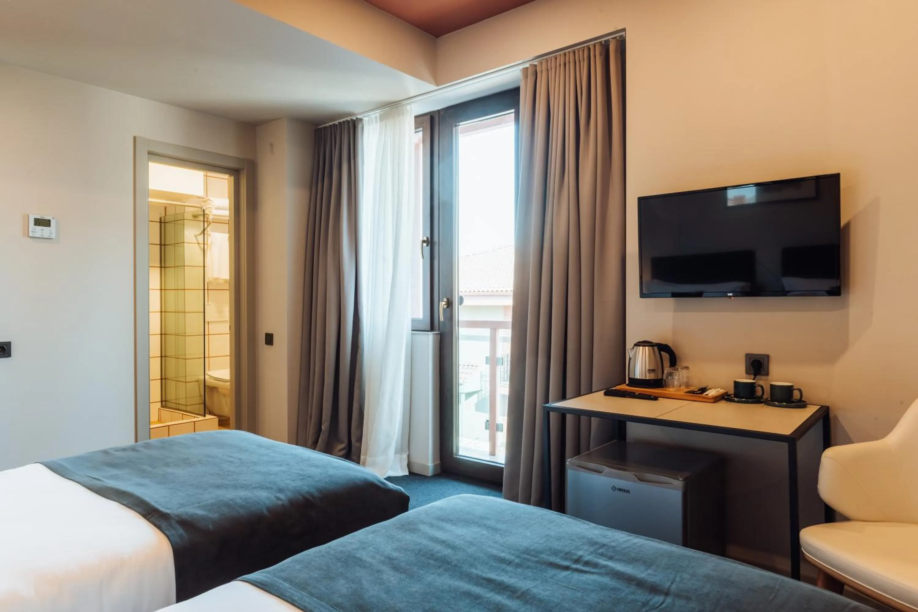 Bed in Reikartz King Tamar Tbilisi