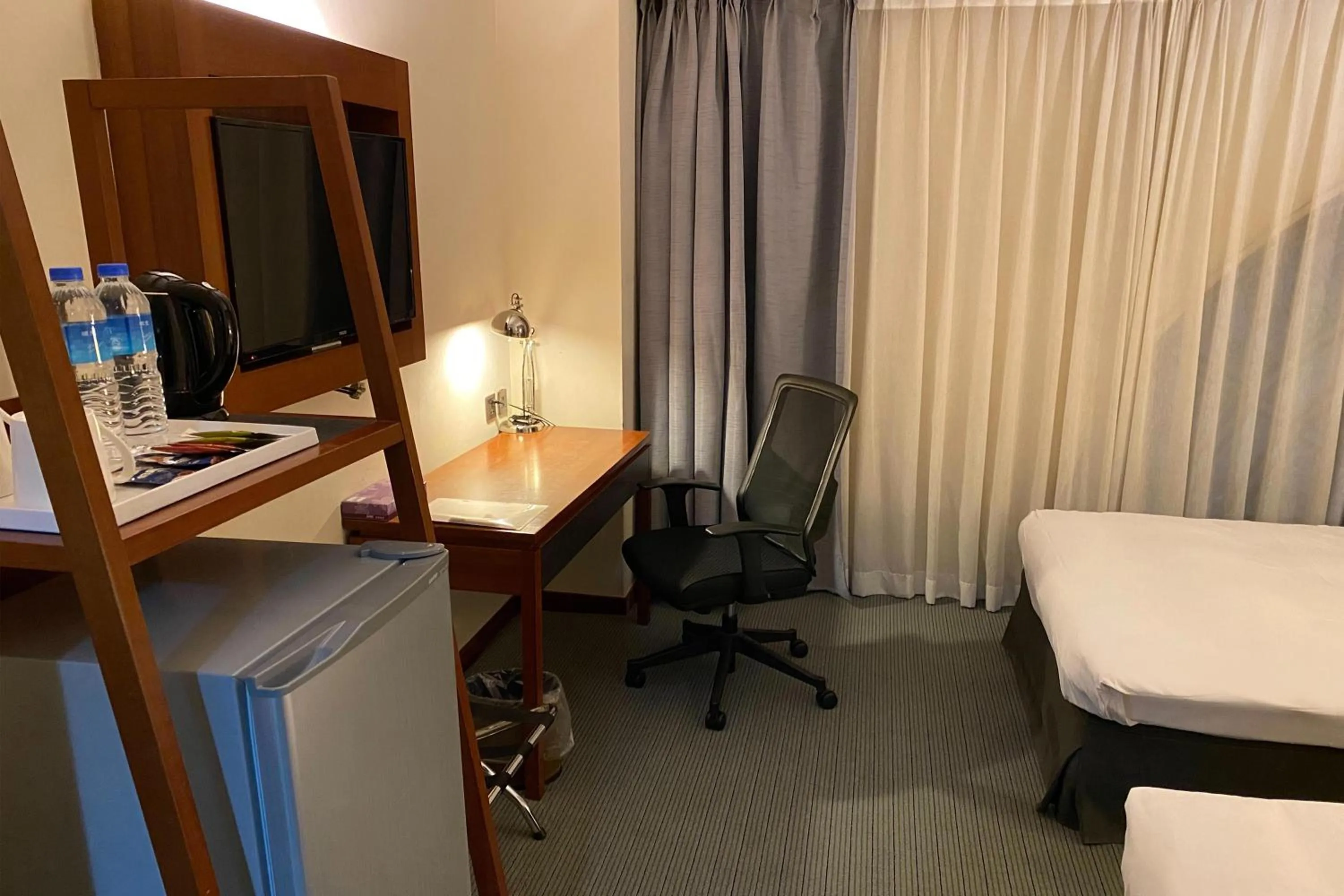 Photo of the whole room, Bed in Guide Hotel Hsinchu Zhongyang