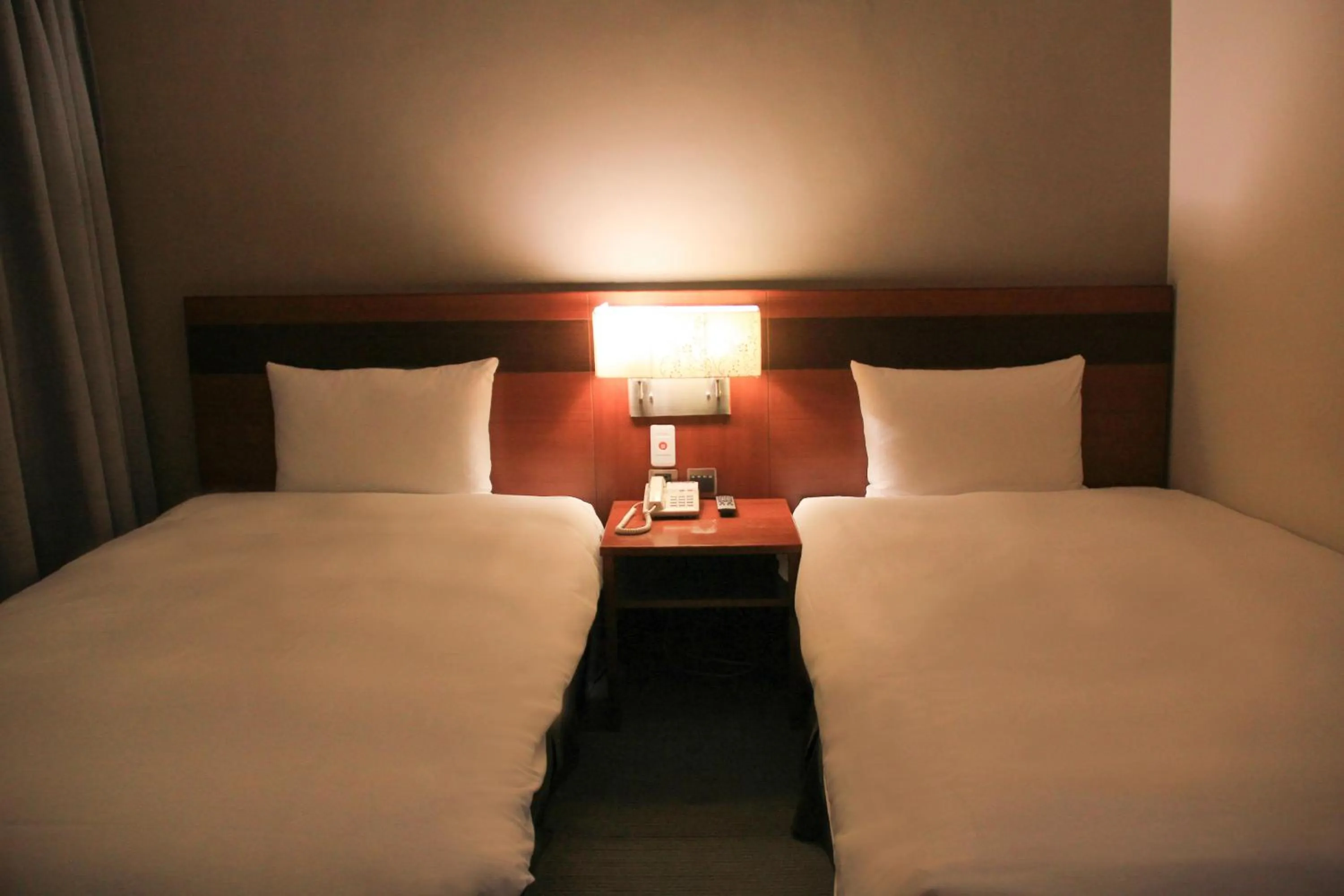 Bed in Guide Hotel Hsinchu Zhongyang