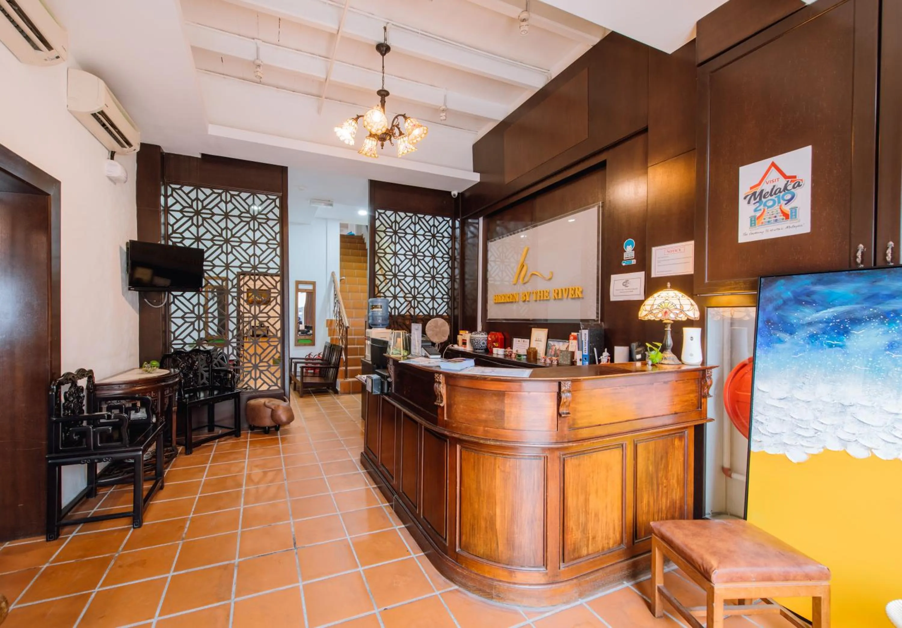 Lobby or reception in Heeren By The River