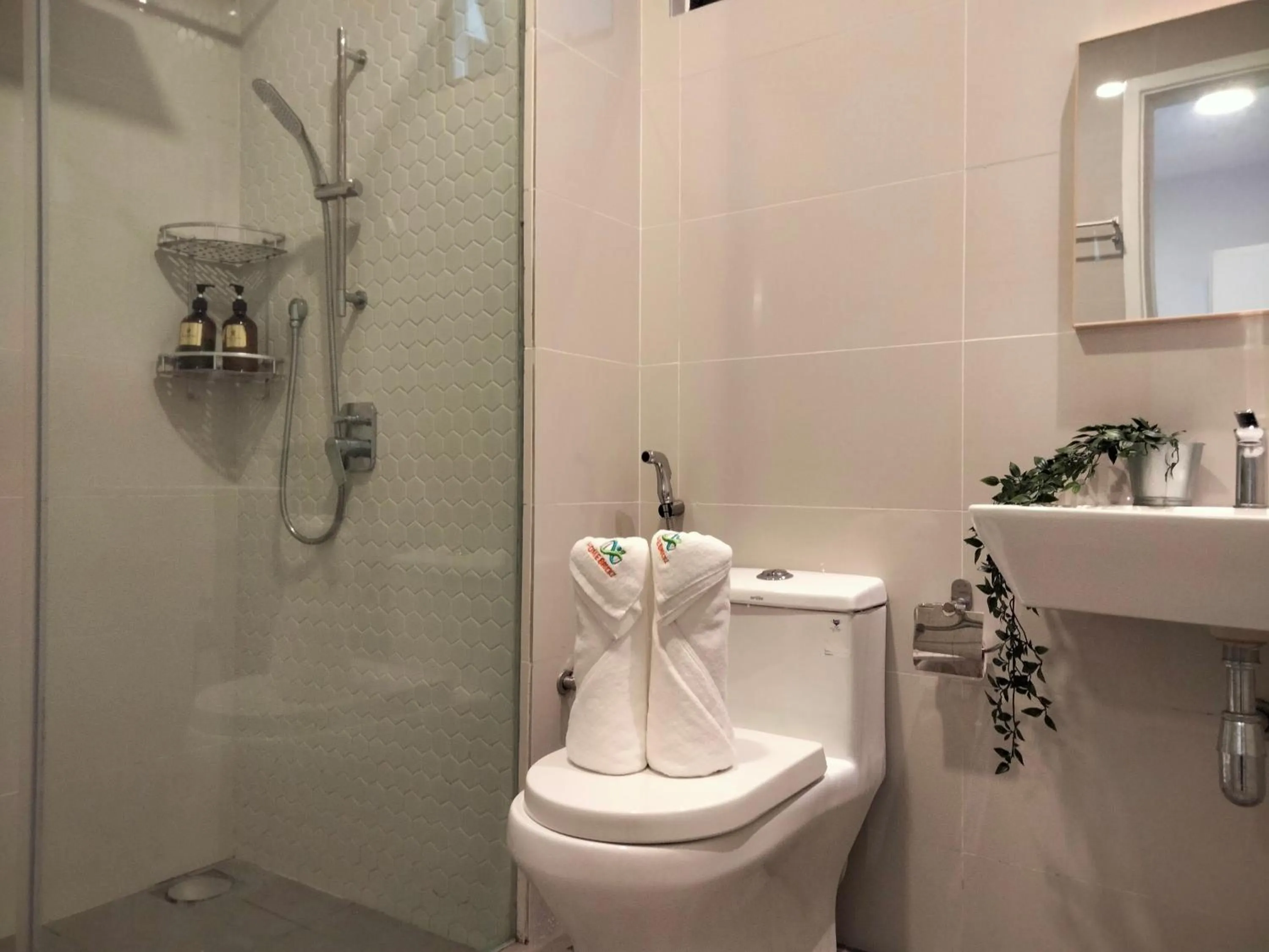 Toilet in Continew Residence by HomeBrickz