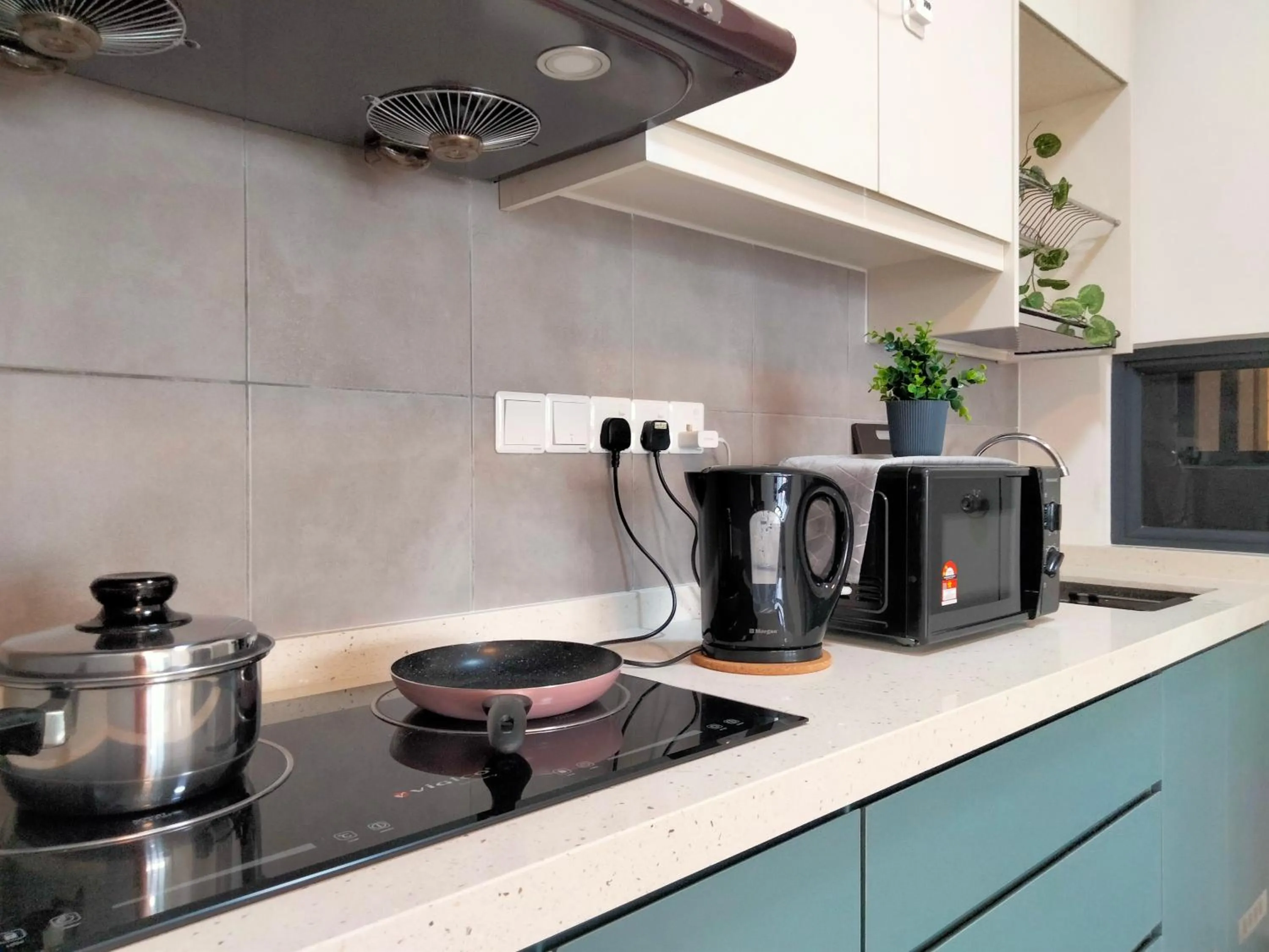 Kitchen or kitchenette in Continew Residence by HomeBrickz