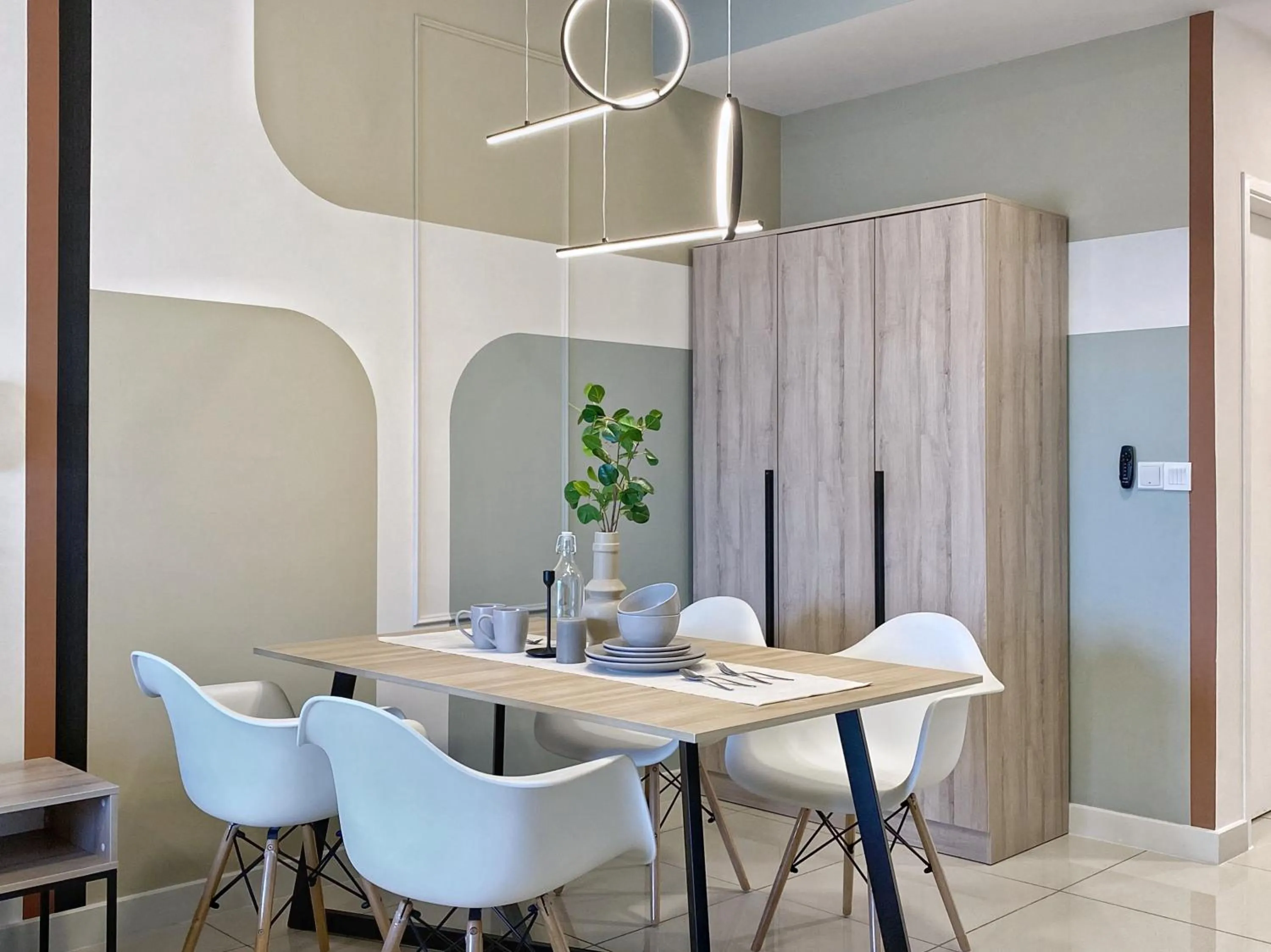 Dining area in Continew Residence by HomeBrickz