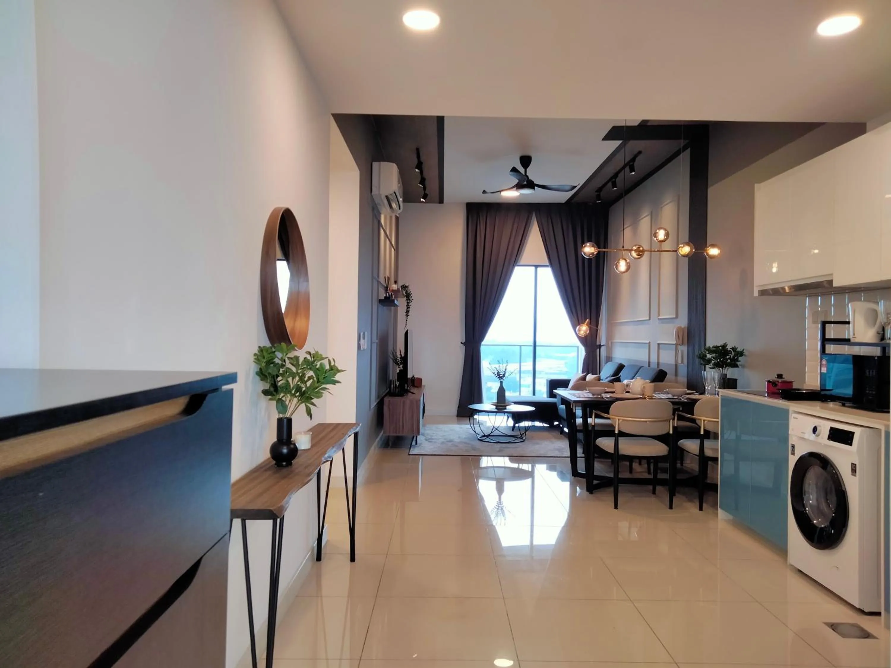 Living room in Continew Residence by HomeBrickz