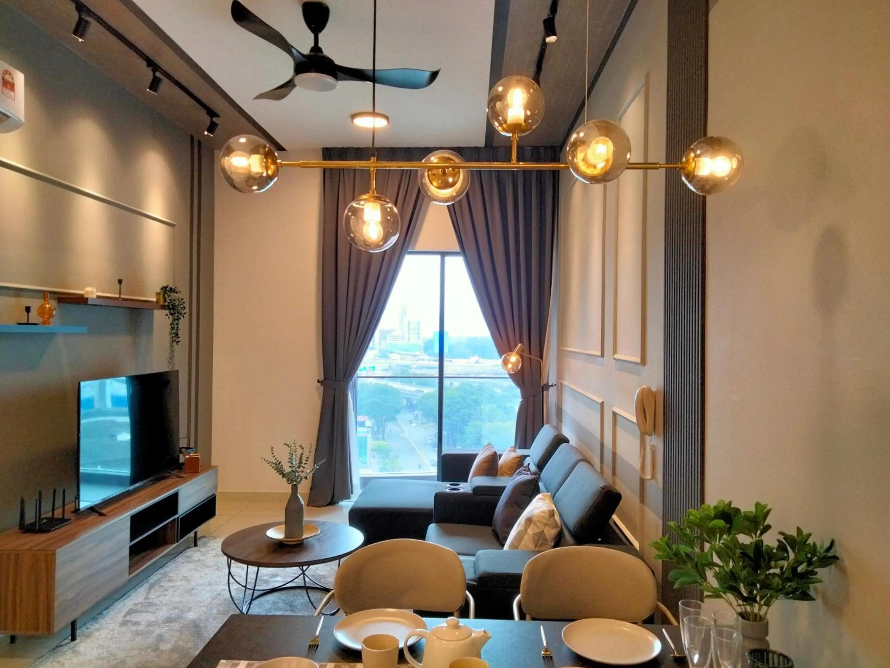 Living room in Continew Residence by HomeBrickz