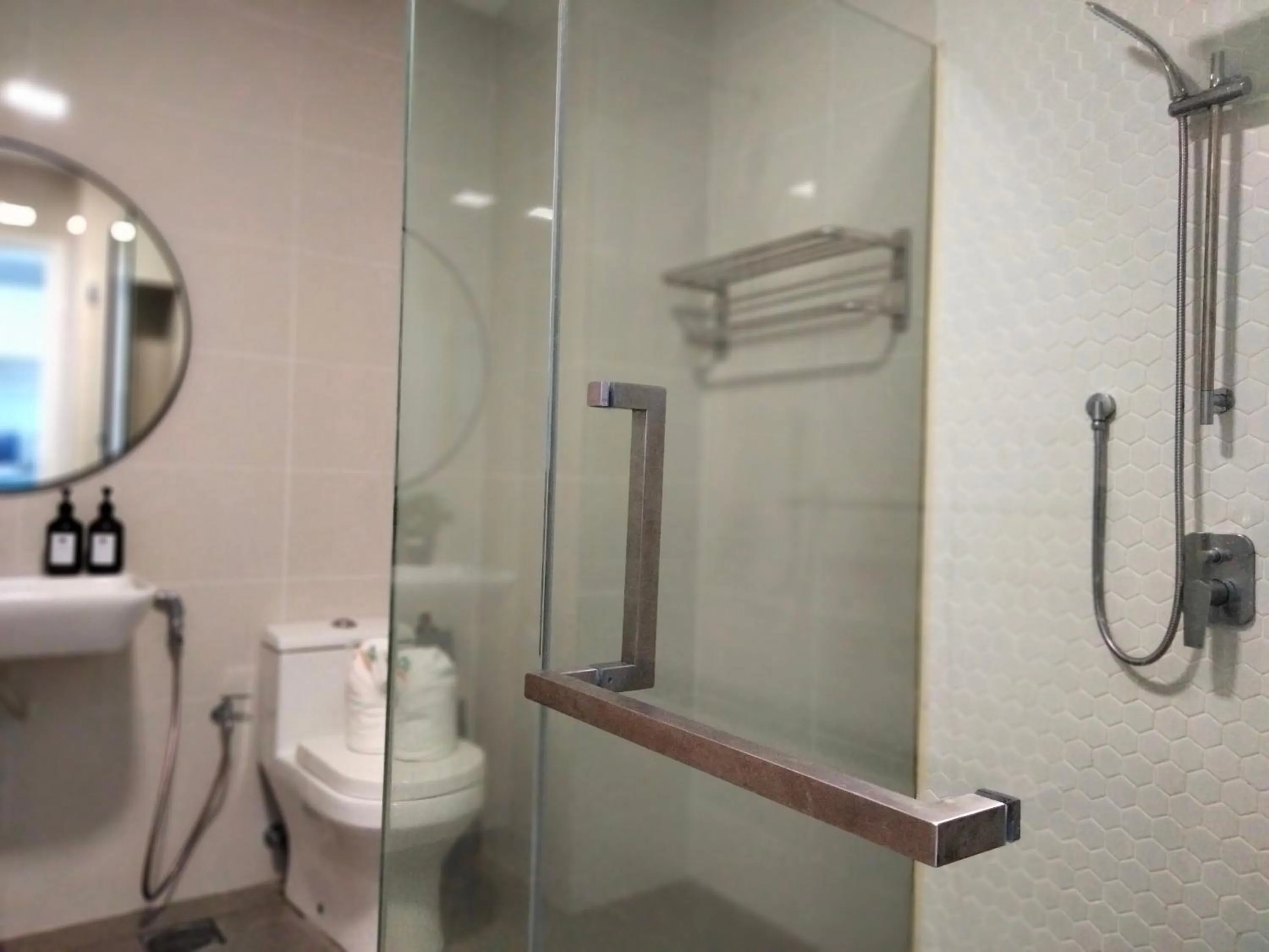 Shower in Continew Residence by HomeBrickz