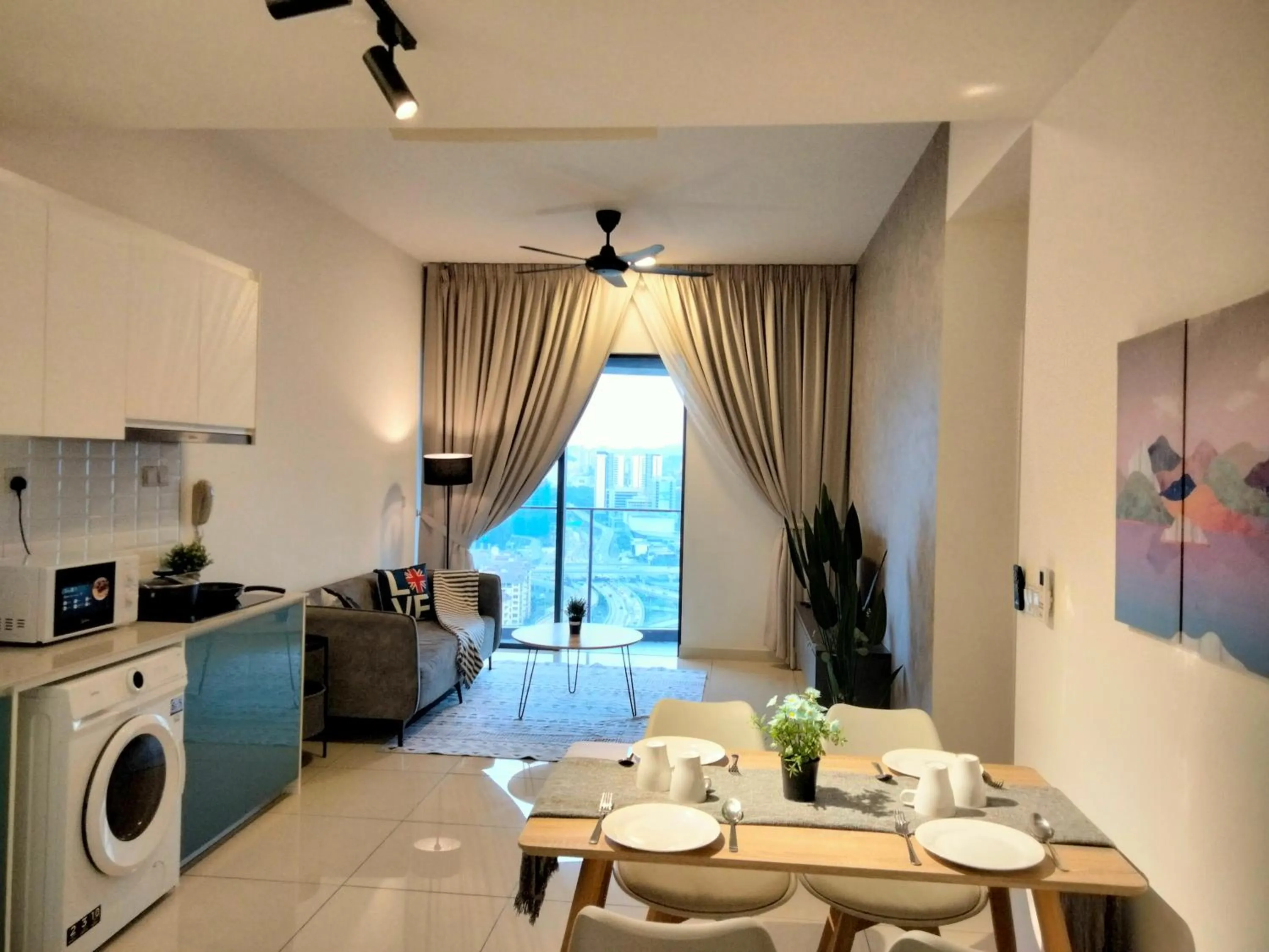 Living room in Continew Residence by HomeBrickz